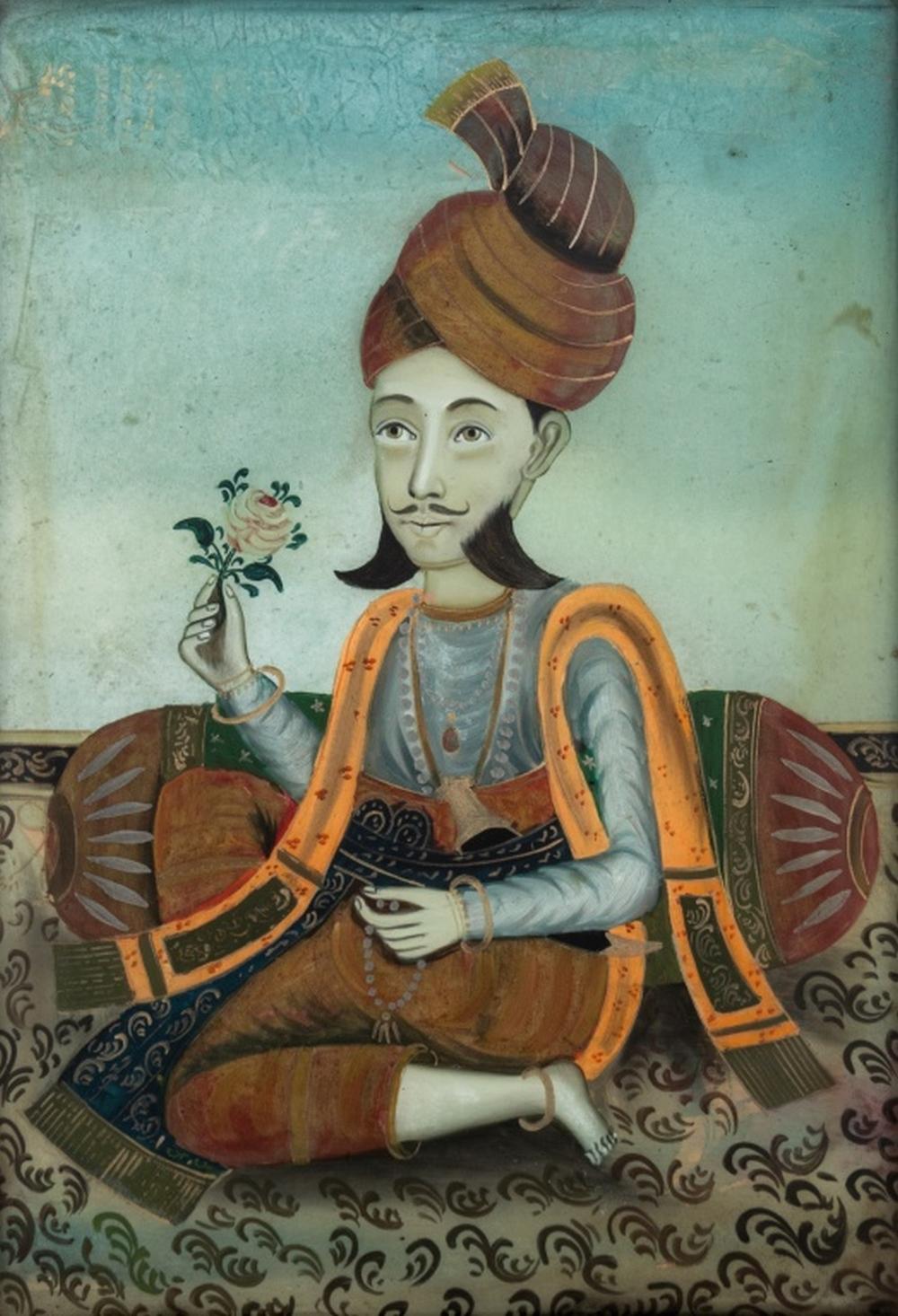 Indian Reverse Glass Painted Portrait of Nobleman seated holding a rose and gold painted accents, black painted frame, 19th century. 19.25