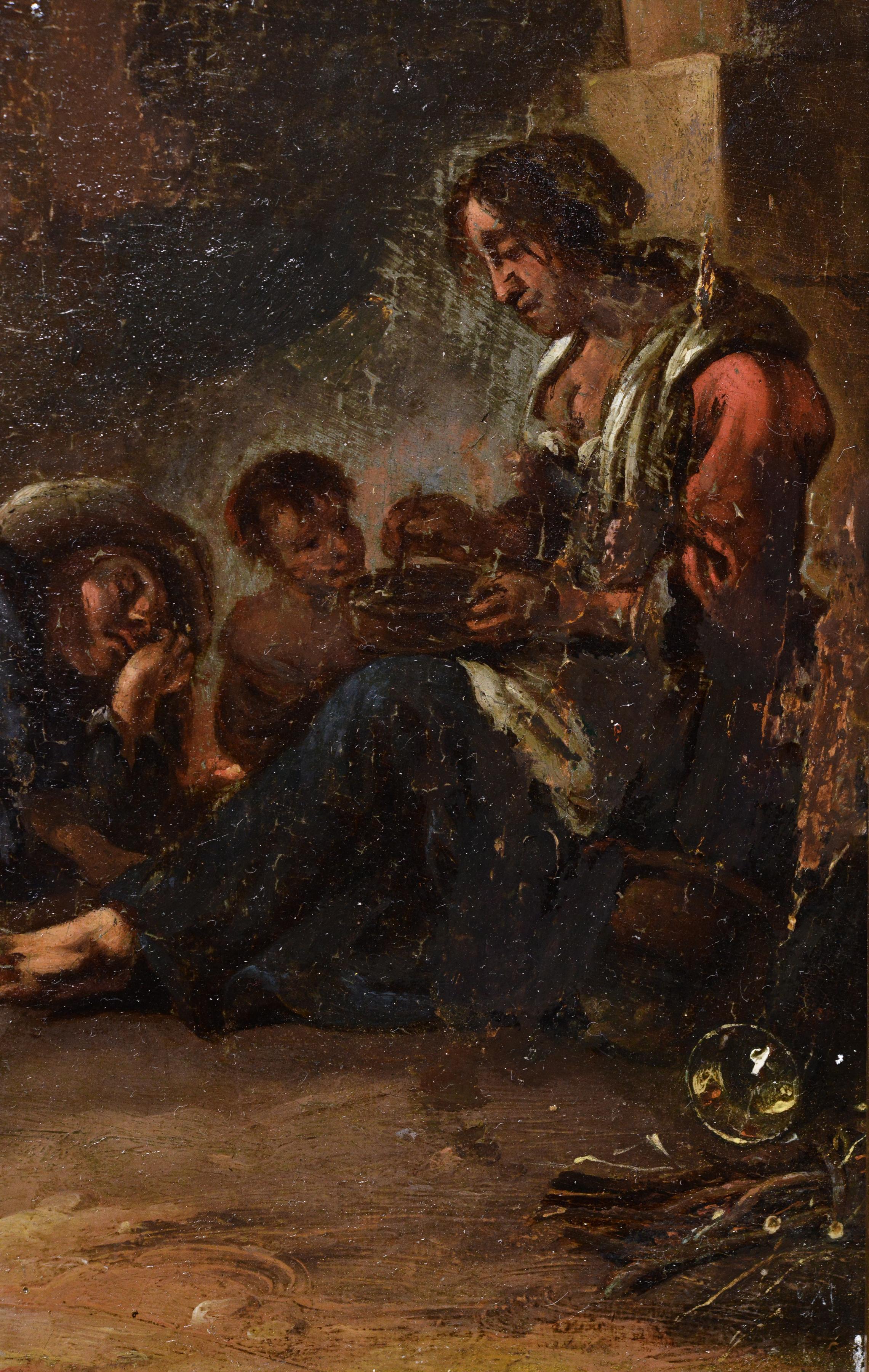 Très bien exécutée, cette œuvre d'art du milieu du XVIIIe siècle, plutôt une étude à l'huile, représente une famille se reposant à l'abri du soleil brûlant de midi dans une arche en forme de grotte dans un quartier en ruine de Townes. La mère