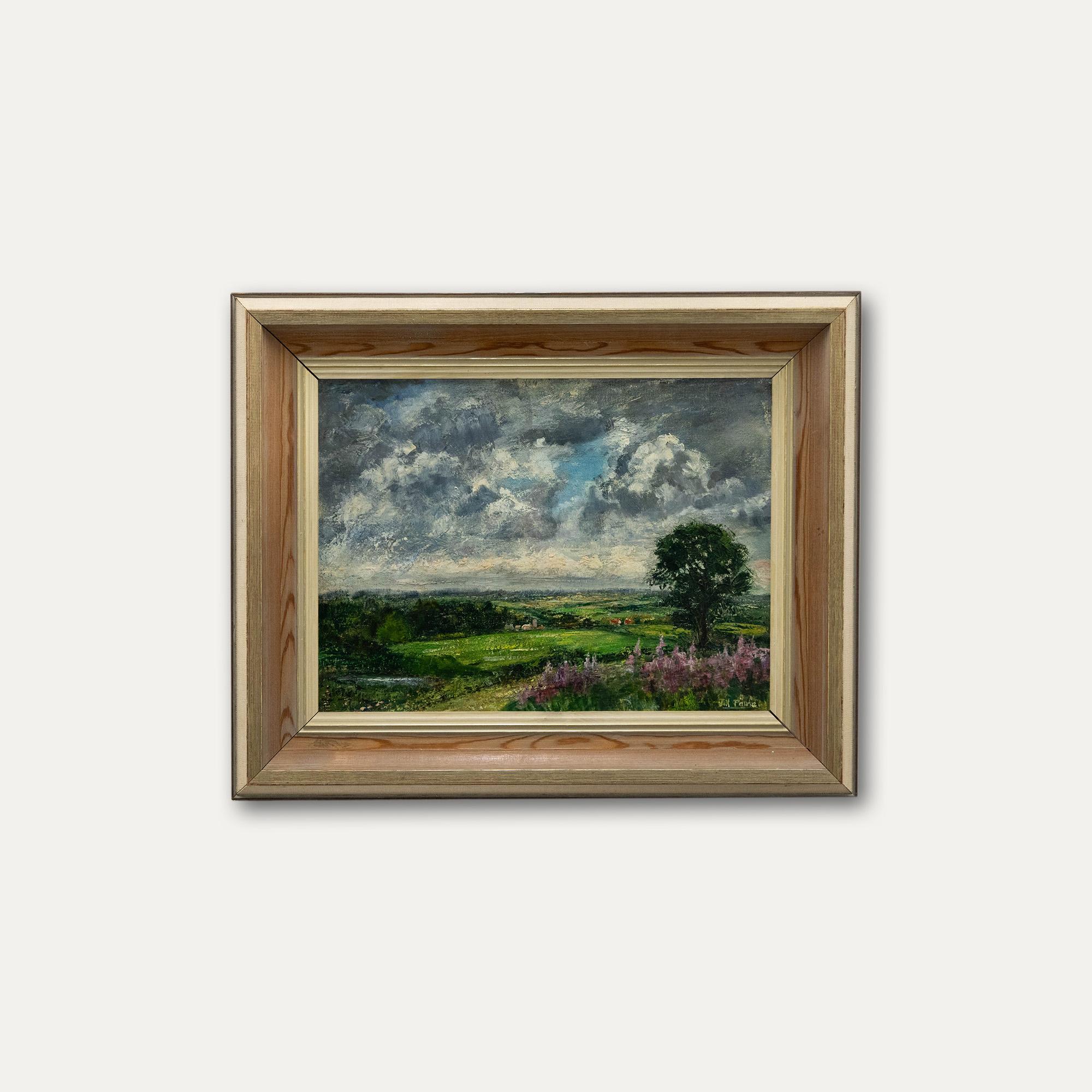This vibrant oil depicts a breathtaking view above the Norfolk village of Letheringsett with heavy rain clouds waiting to break. The painting has been signed by the artist to the lower right. Well presented in a wooden frame with a signed artist