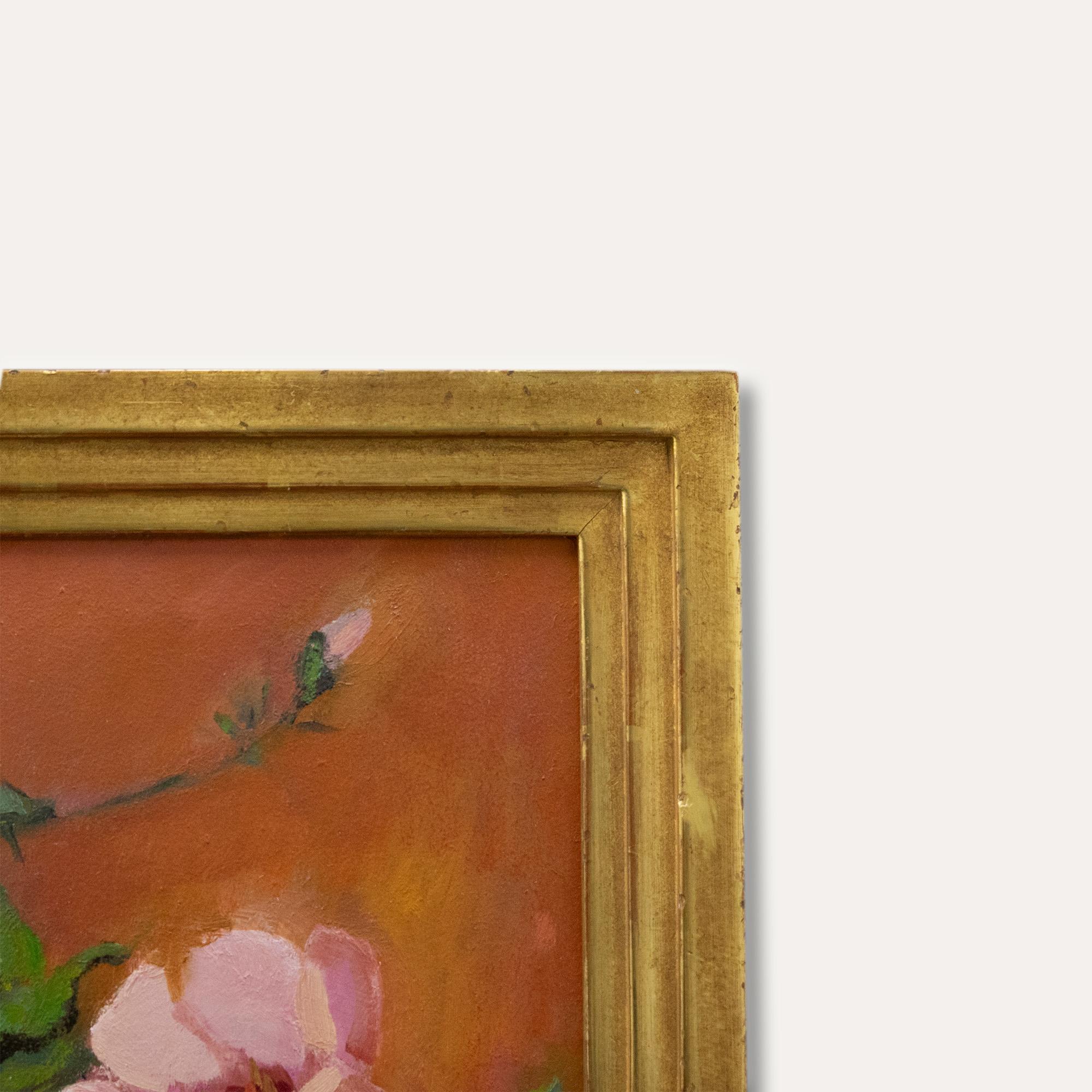 A vibrant still life of pink flowers in a vase, with apples from the garden. Well-presented in a decorative gilt-effect frame. Signed. On board.
