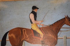 Jockey mit rosa Ärmeln reitet auf einem Rennpferd