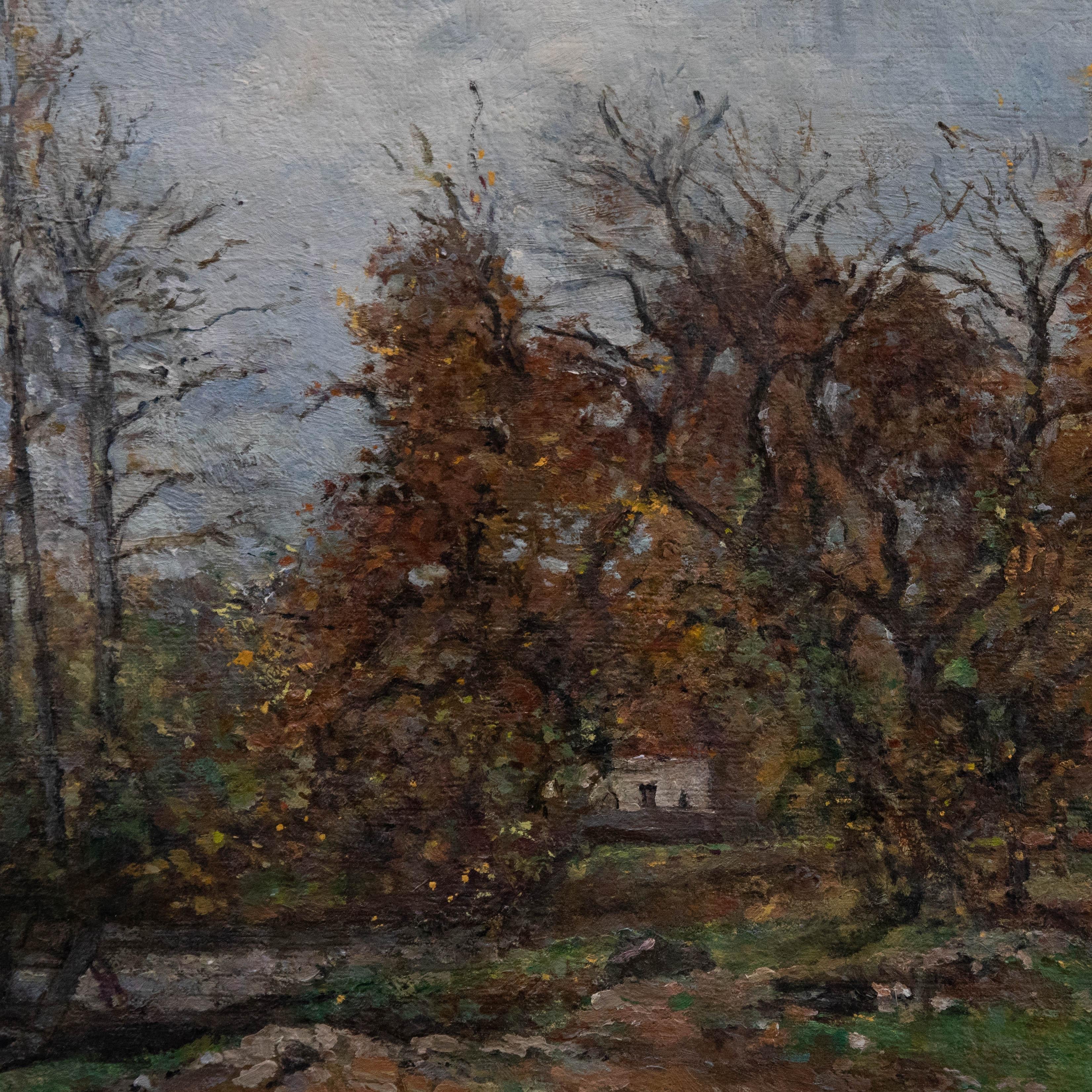 A charming oil study by well listed artist Josephine Haswell Miller. The scene depicts a meadow lined with trees in late autumn. Through the branches a quaint cottage can be seen in the near distance. The artist demonstrates an accomplished hand in
