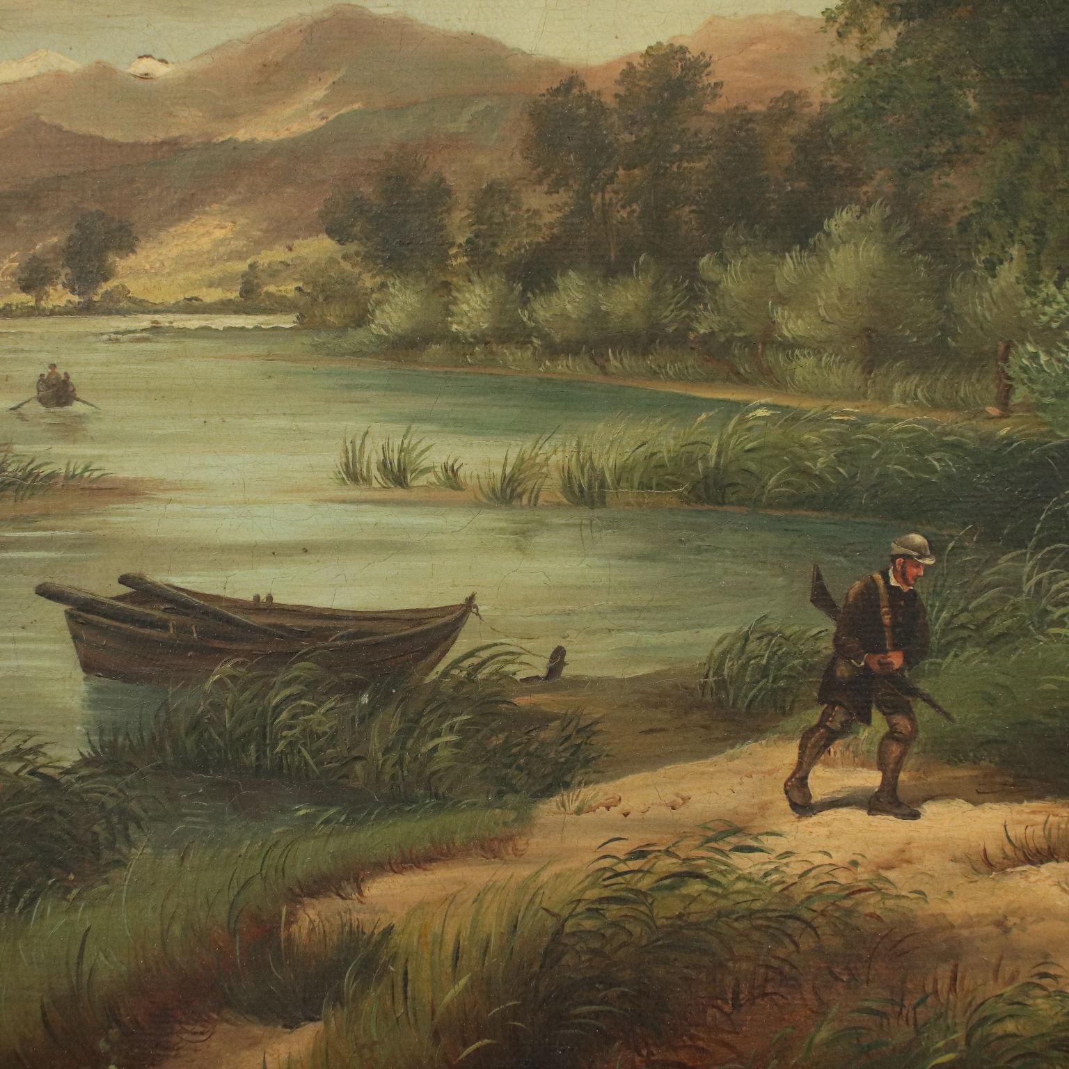 Oil on canvas. The romantic landscape portrays a verdant countryside near a river, under a leaden sky full of grey clouds; on the trail in the foreground, some hunters, right off the moored boat, follow their dogs towards the stand of trees.
The