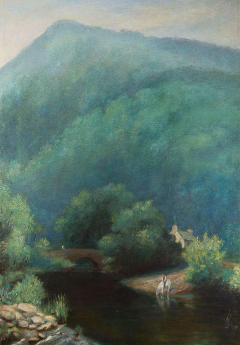 An exquisite turn of the century landscape capturing a deep river valley. The large mountains dominate the composition, dwarfing the figure on horseback beside the river. His horse takes a drink from the dark waters of the river and a lone figure
