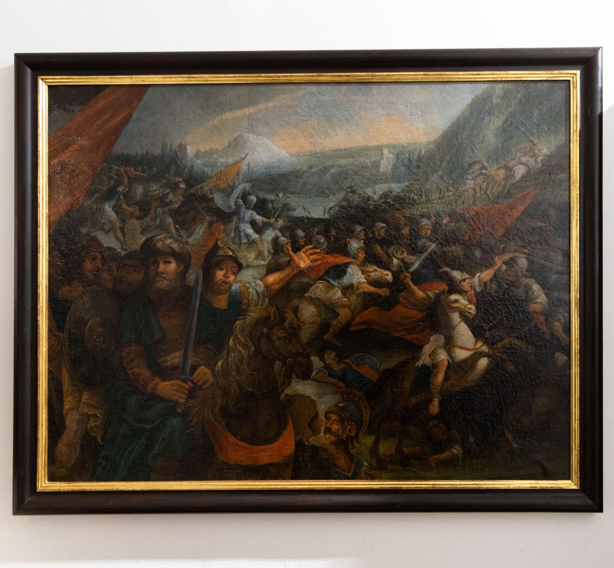 Antique battle scene with horsemen in front of landscape scenery. Oil on canvas. Framed in a black wooden frame with a gold patinated moulding. The canvas with strong craquelure. Size without frame: 108.5 x 143 cm