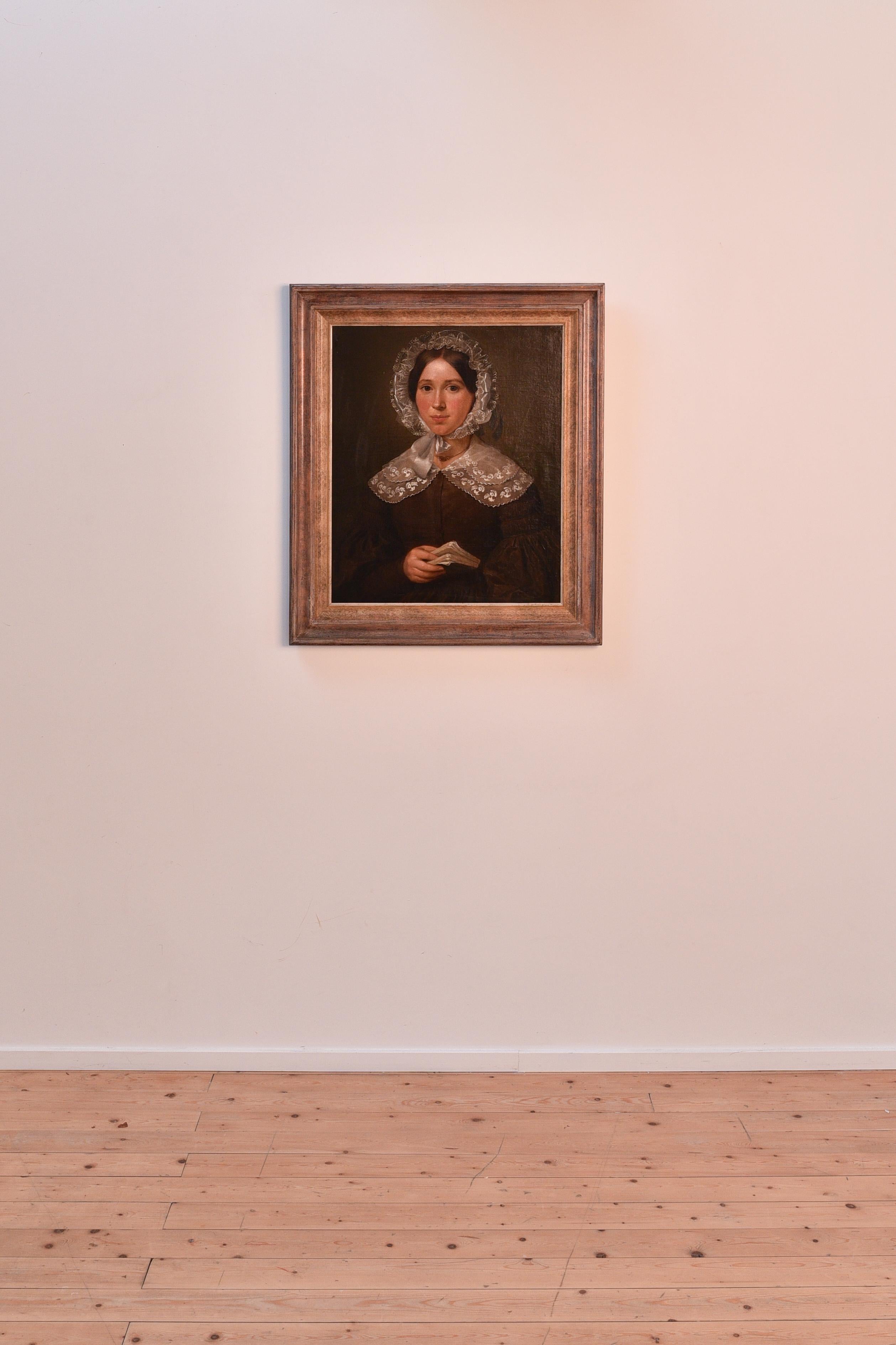Ritratto di donna con libro e merletto, olio su tavola, fine XIX secolo - Painting di Unknown