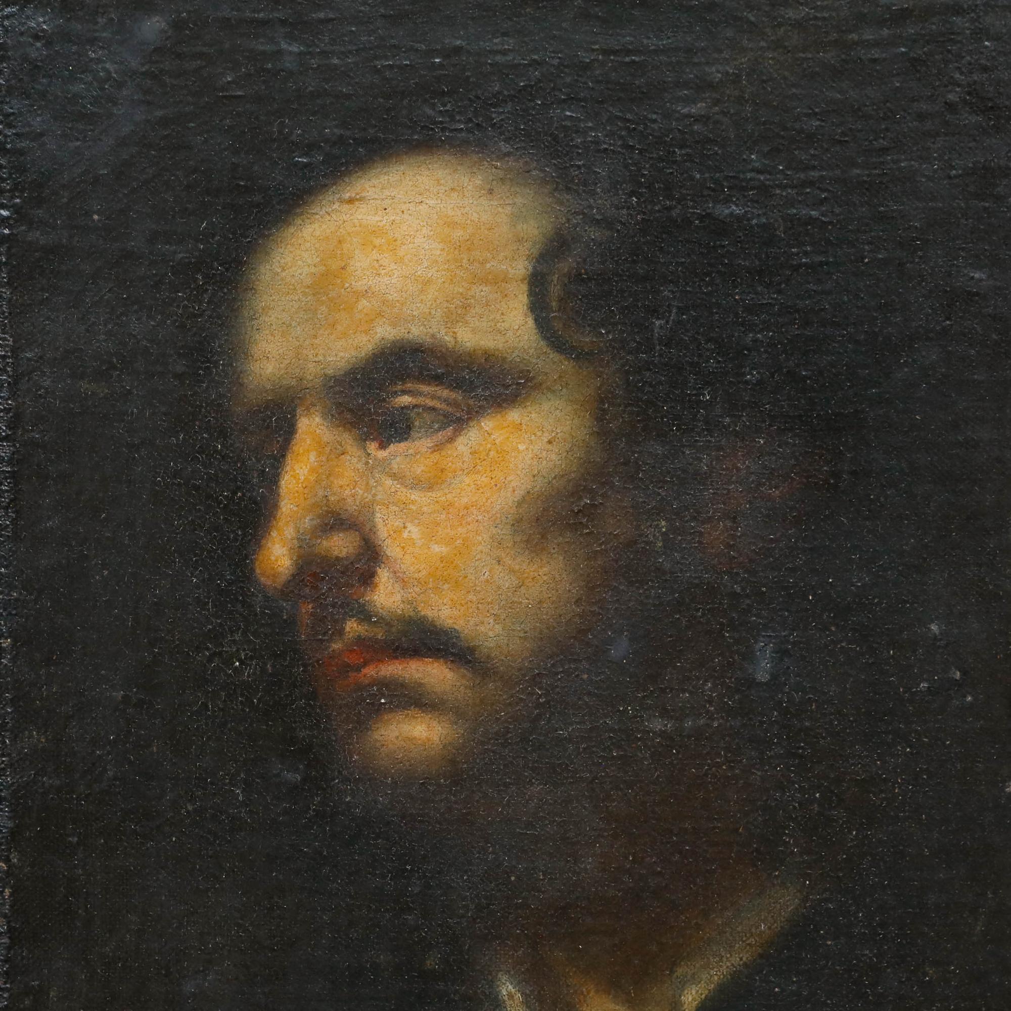 This striking portrait emerges from deep shadows, with warm golden tones illuminating the subject's face against a dark background. The composition is tightly focused on the profile view, creating an intimate and contemplative mood enhanced by the