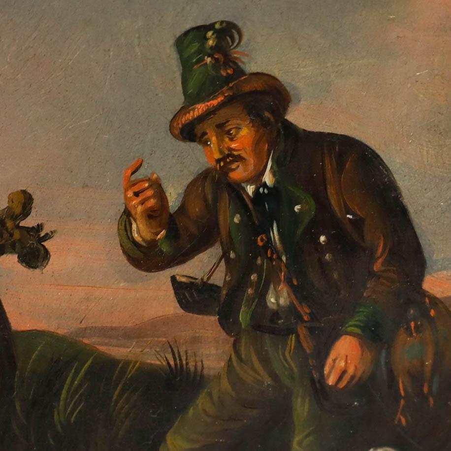 This evocative late 19th century oil depicts a huntsman and his dog discovering a fox in a gin trap. Unsigned. On tin.
