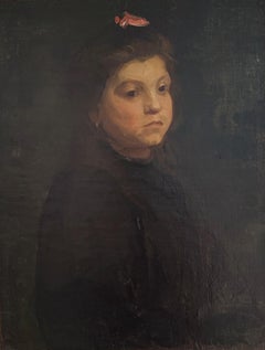 Little girl with a red bow in her hair