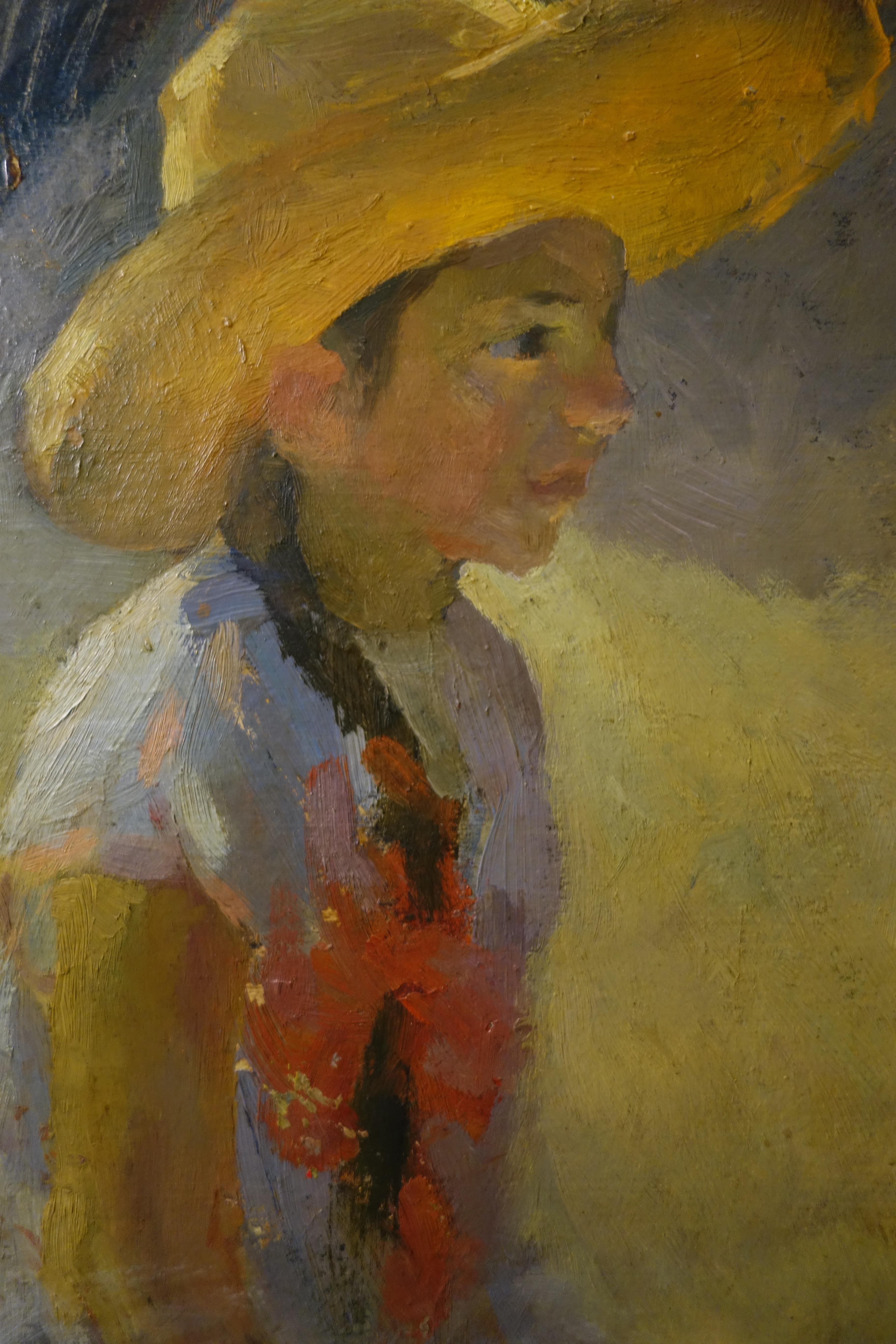 little girl in a straw hat