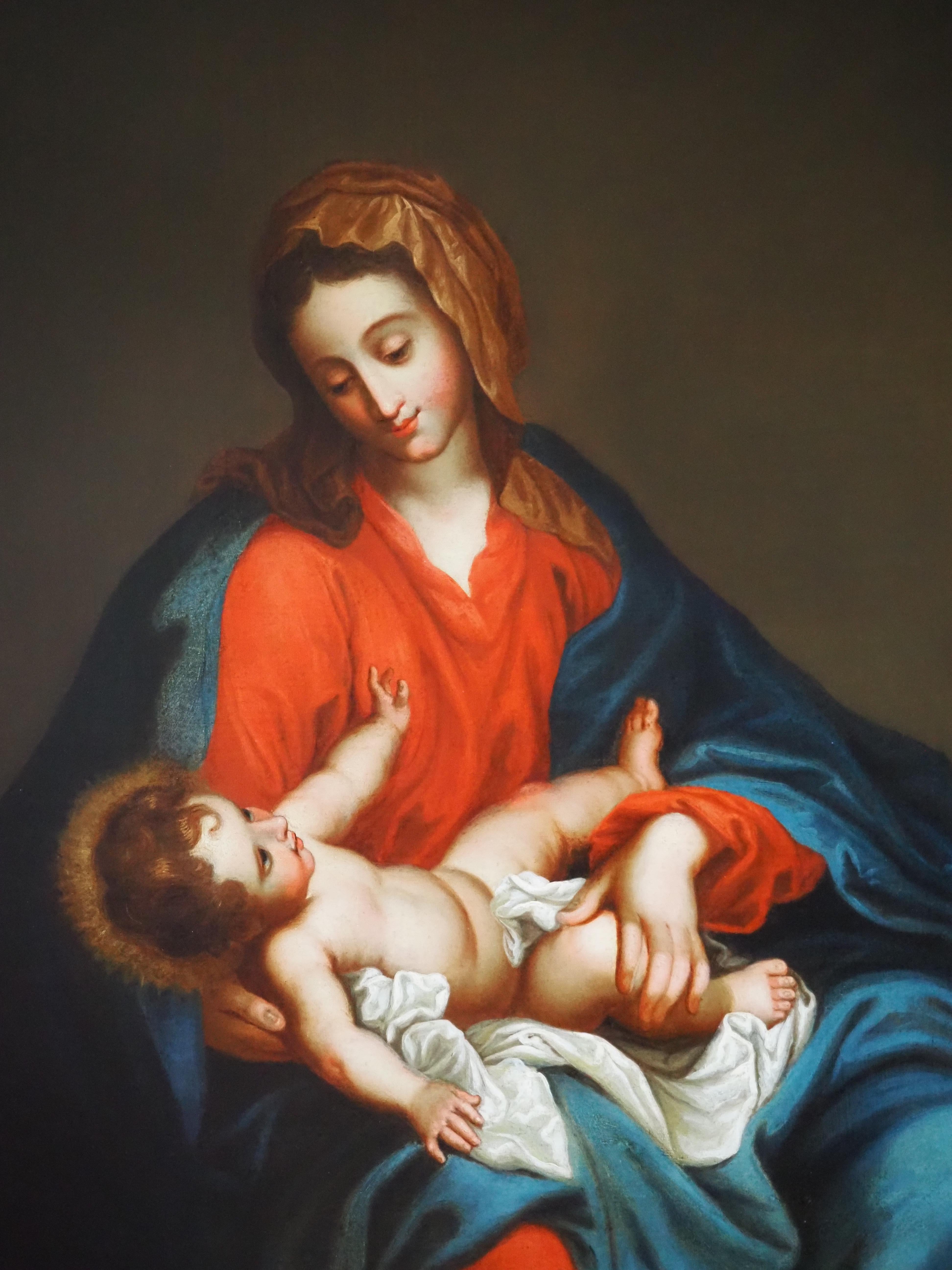 Escuela italiana, siglo XVIII
Representados la Virgen y el Niño Jesús, la virgen María sostiene al Niño Jesús amorosamente en sus brazos. El niño, tumbado sobre un fardo de tela y con un nimbo alrededor de la cabeza (que expresa su naturaleza