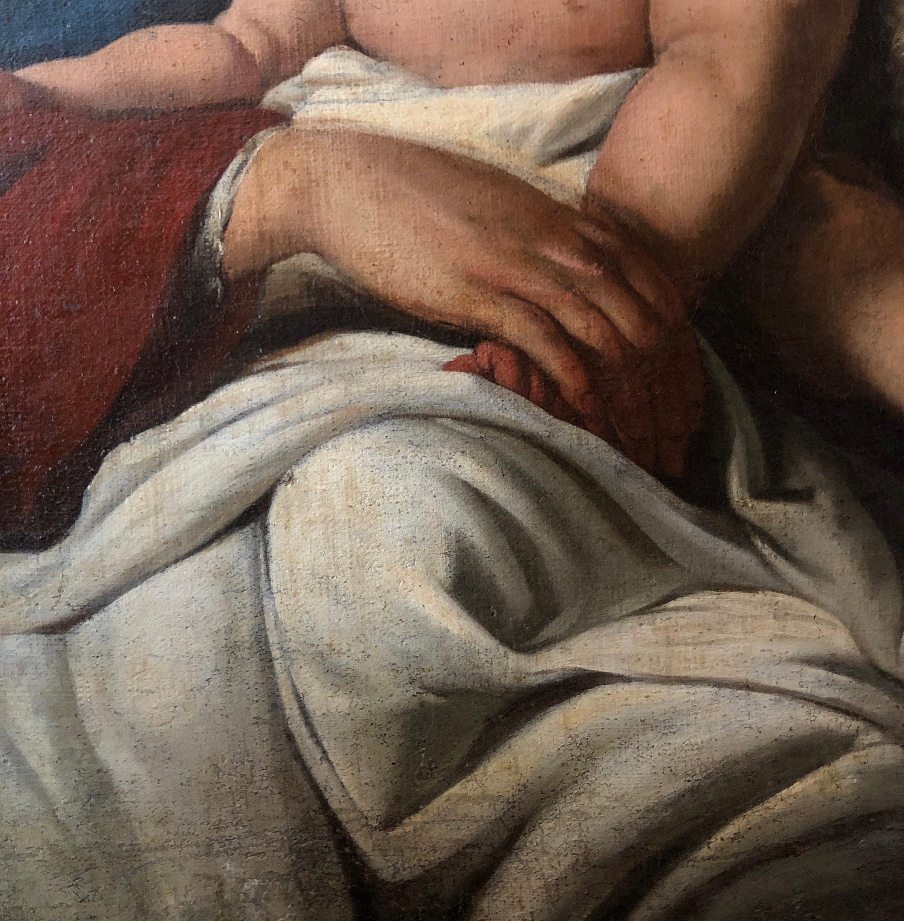 Peinture religieuse italienne de l'école lombarde Vierge à l'enfant et saint Jean  vers 1650, avec une composition équilibrée et harmonieuse au centre de laquelle se trouve l'Enfant, la tête entourée de rayons de lumière, enveloppé d'une draperie