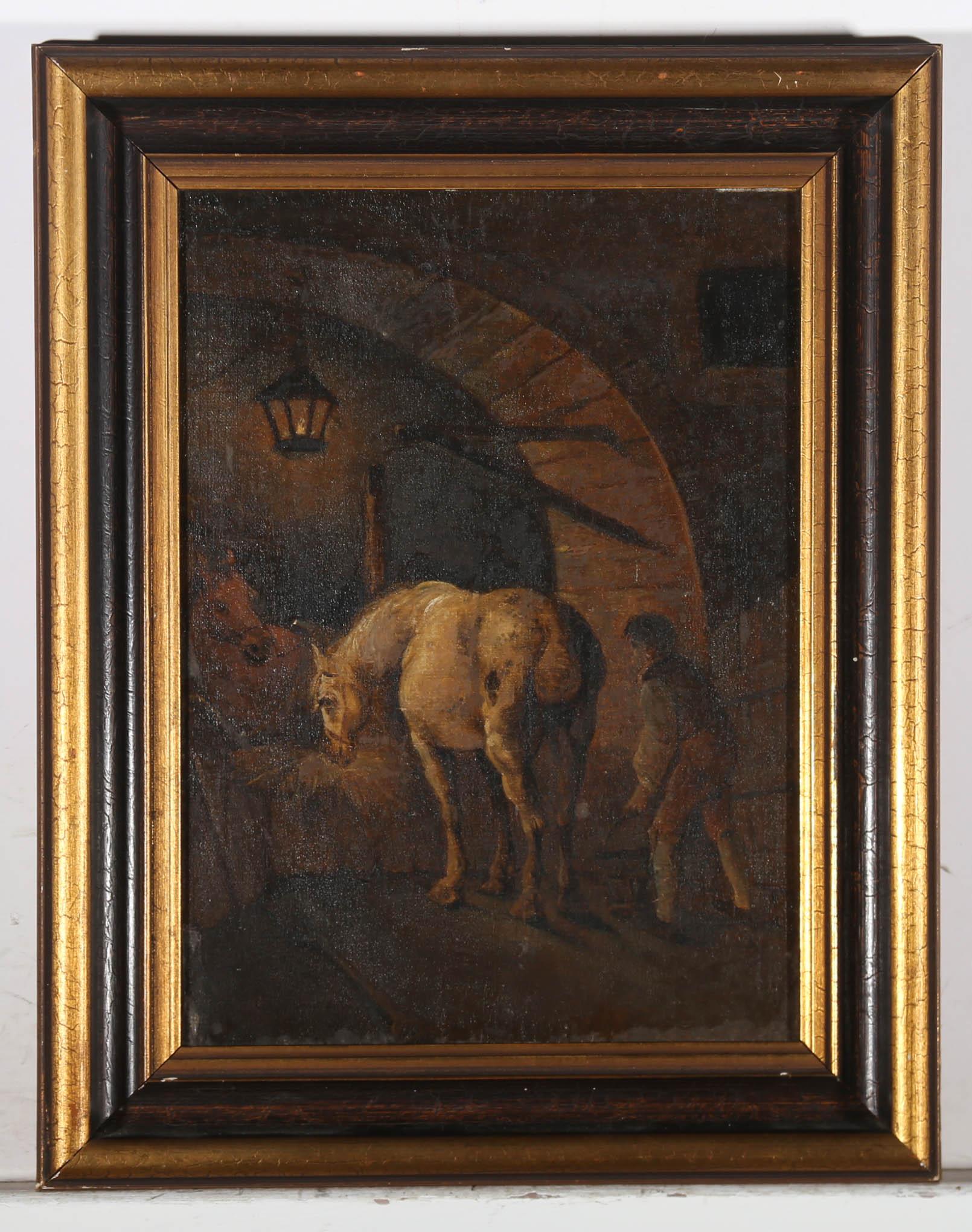A fine 19th Century oil scene in the manner of Joseph Wright, showing a stable interior with two horses feeding at a hay box. A stable hand enters the stable with a pail of water. The painting is unsigned and presented in a 20th Century gilt frame.