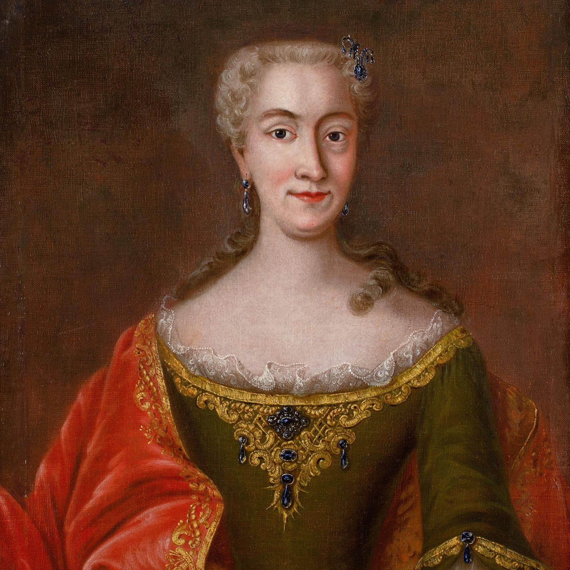 This charming mid-18th-century half-length French portrait depicts a lady wearing an olive green gown, together with a red cloak, and exquisite sapphire jewellery.

Painted circa 1740, this piece can be contextualised by considering Louis Tocqué’s
