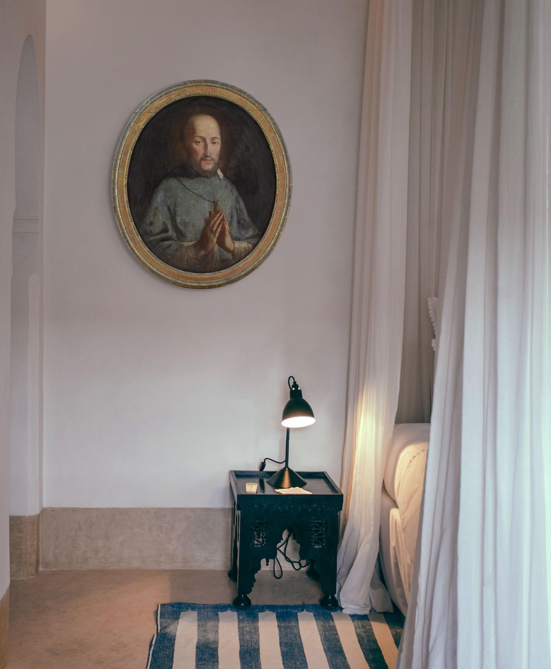 This mid-18th-century Italian oil painting depicts Saint Francis de Sales (1567-1622), Bishop of Geneva, in prayer. It was previously owned by Prior Ottmar Zwiebelhofer of the Benedictine Abbey in Ettenheimmünster, Germany and thence by descent