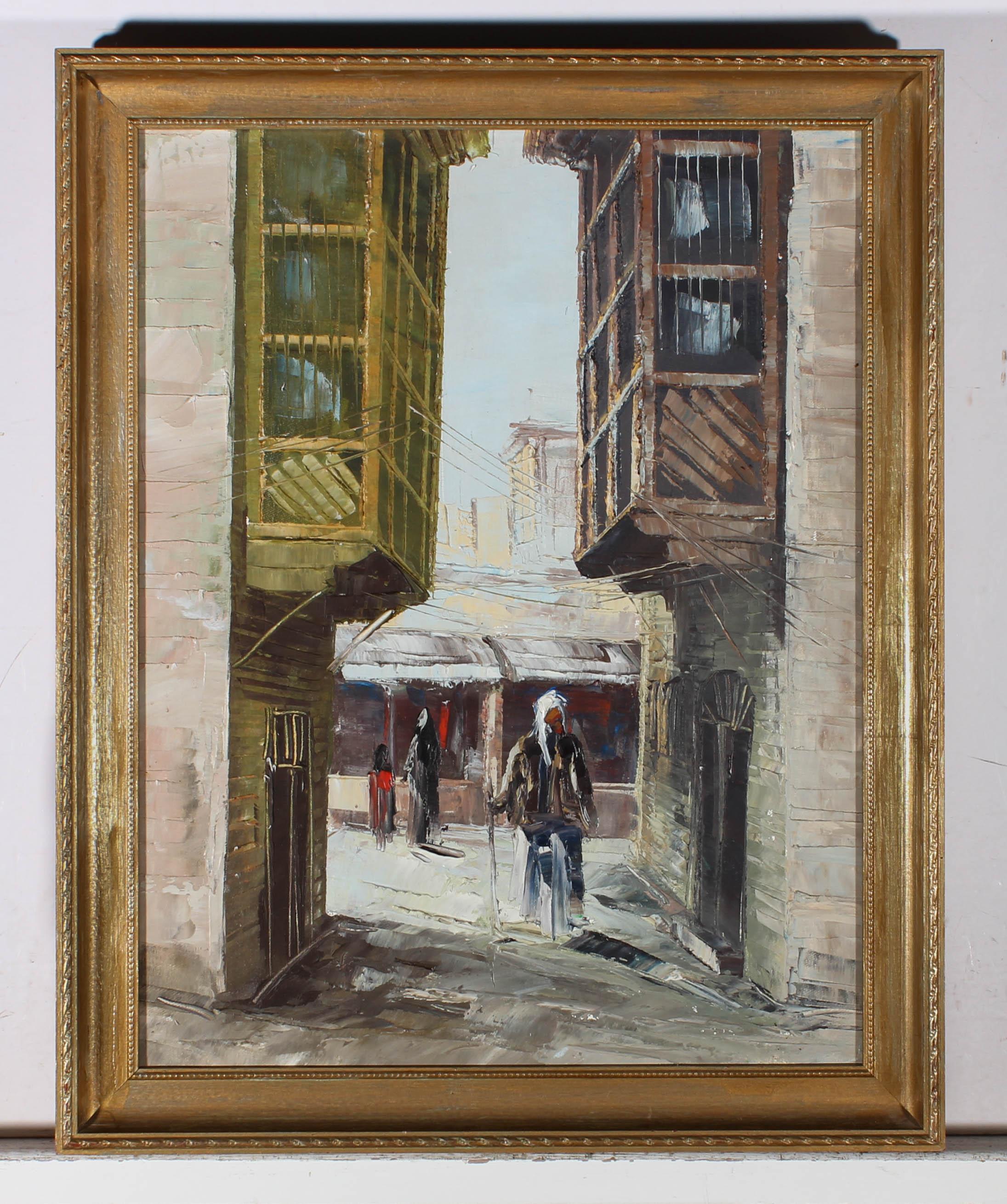 A delightful oil study of figures wandering the streets, the artist has used the impasto and scraffito techniques across the work. Well presented in a gilt frame and left unsigned. On canvas on stretchers.