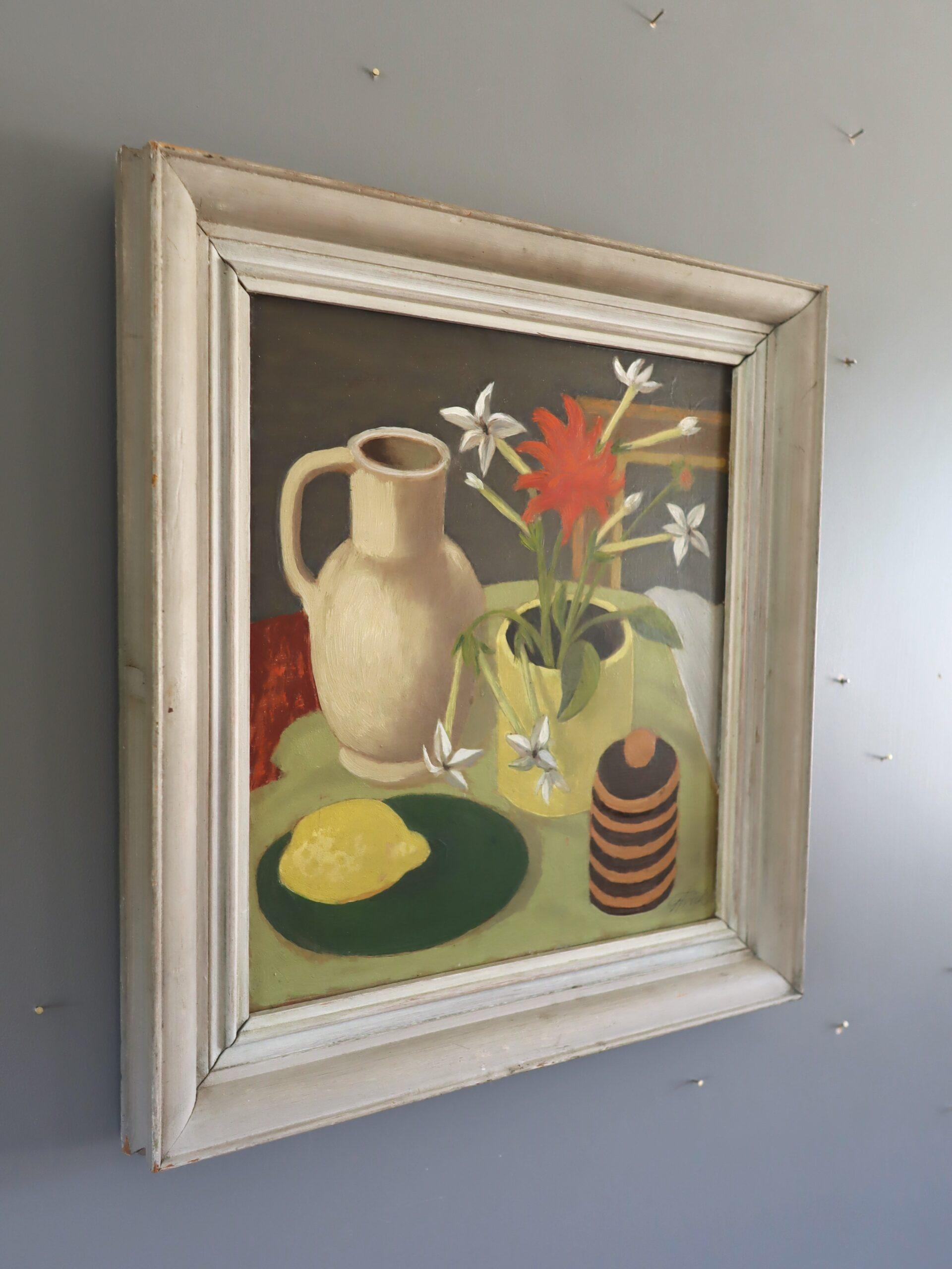 LEMON & BLOOMS
Size: 43 x 40 cm (including frame)
Oil on board

A charming and elegant mid-century interior still life painting, executed in oil onto board.

At the centre sits a yellow ceramic pot bursting with vibrant red and white blooms, flanked