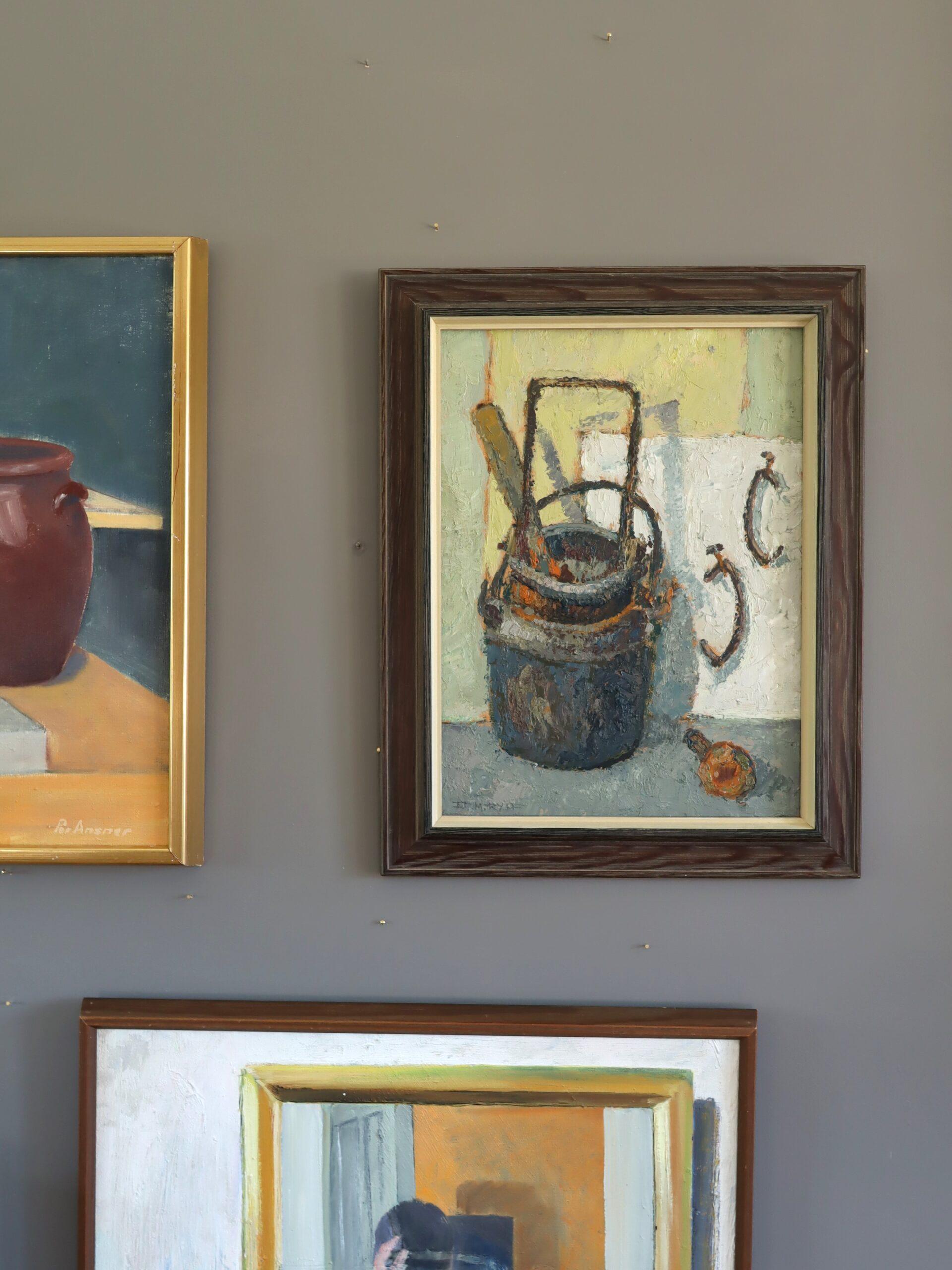 BUCKETS & HOOKS
Size: 48 x 38 cm (including frame)
Oil on board

An expressive and richly textured mid-century still life that captures the quiet composure of everyday objects, executed in oil onto board.

At the heart of the composition is a