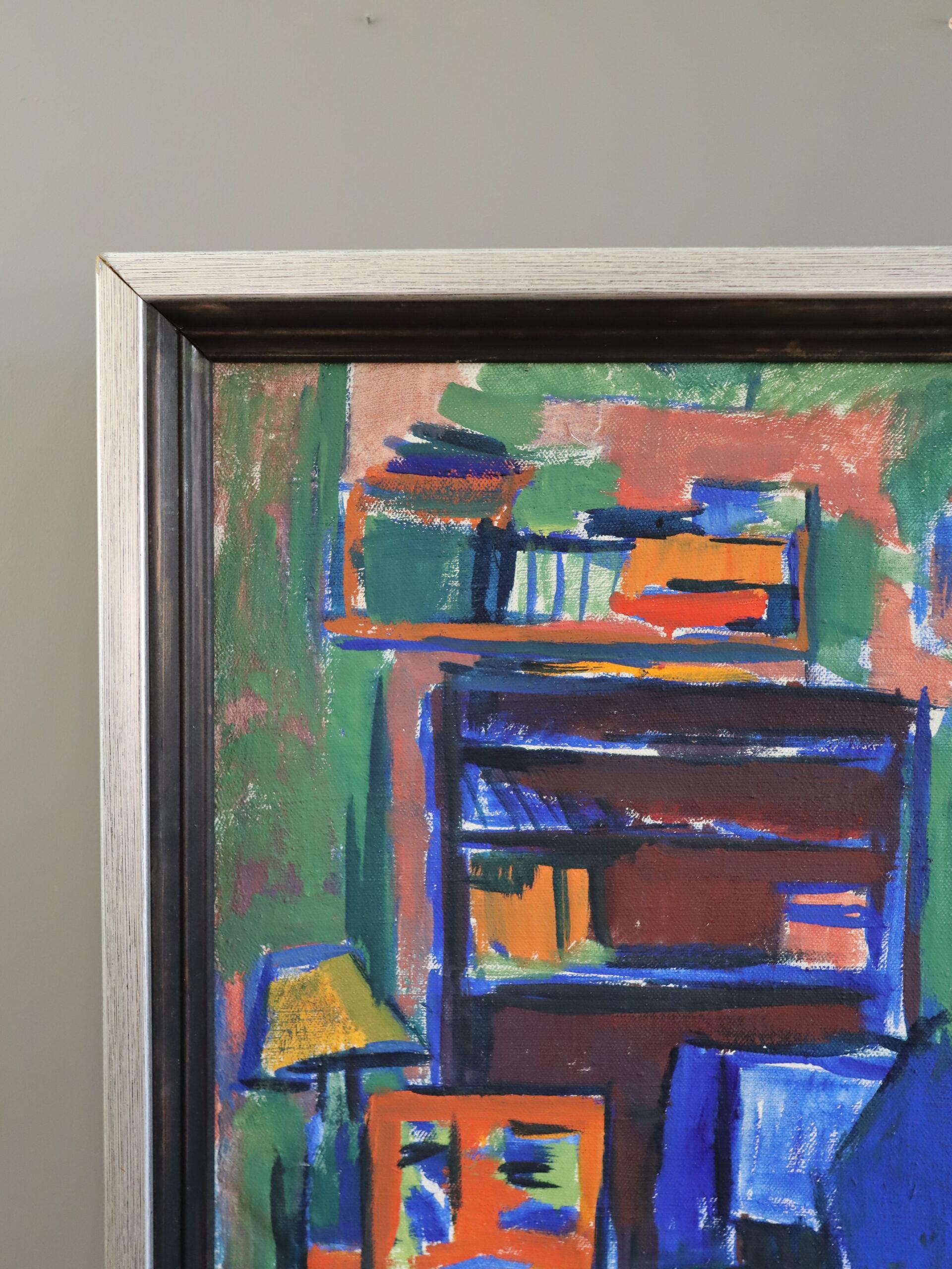INTERNI VIVACI
Dimensioni: 54,5 x 70,5 cm (cornice inclusa)
Olio su tela

Un vivace quadro di scena d'interni della metà del secolo scorso  che cattura una rappresentazione vividamente colorata ed espressiva di uno spazio domestico, realizzata a