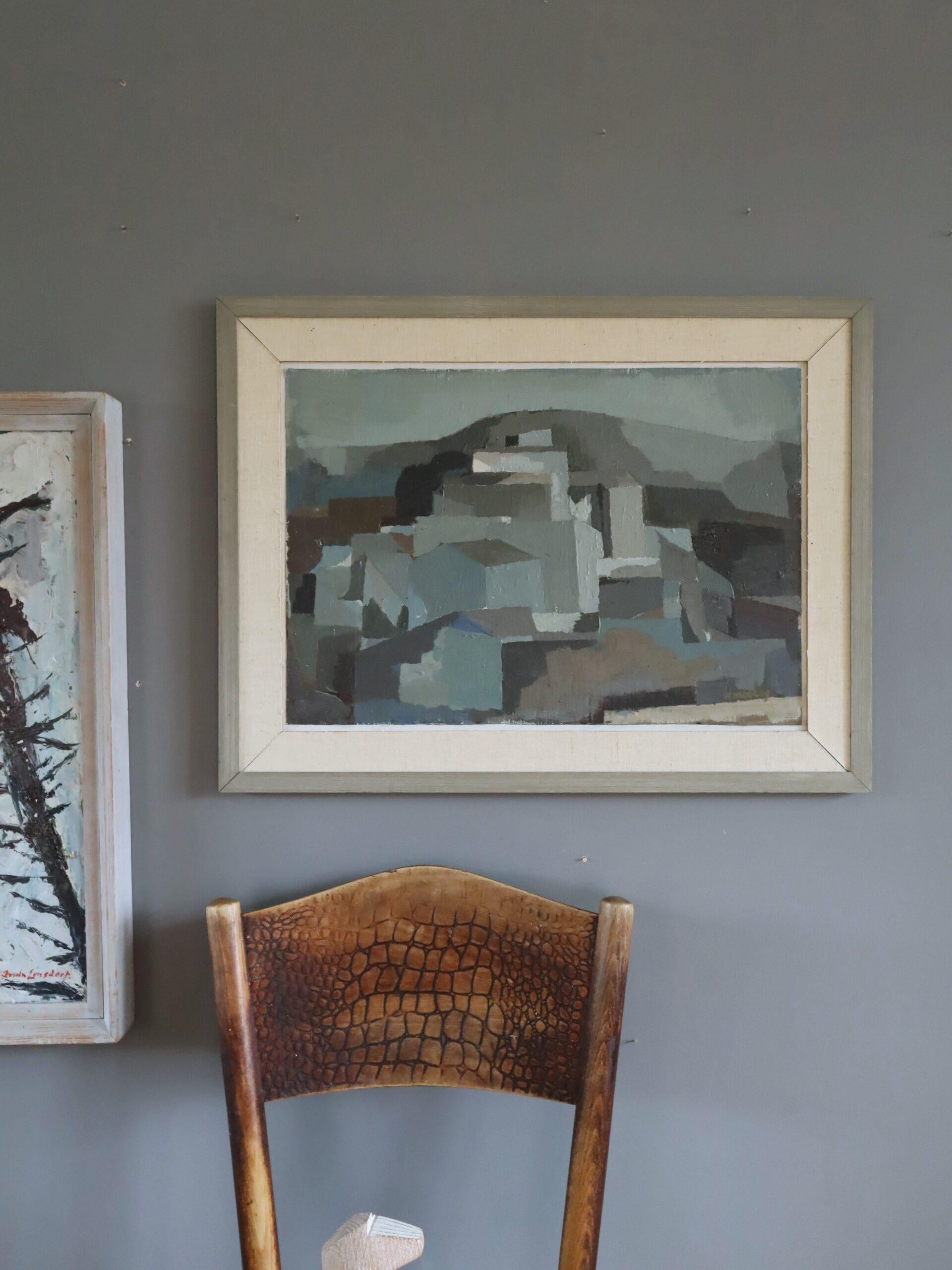 URBAN BLOCKS
Size: 48 x 63.5 cm (including frame)
Oil on board

A striking mid-century abstract cityscape rendered in a restrained muted palette, executed in oil onto board.

The painting captures an imagined urban landscape reduced to essential