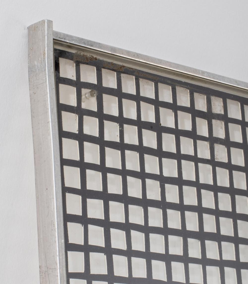 Scuola del XX secolo, Composizione minimalista, Inchiostro su carta a griglia, 1975, quadrati di carta ritagliati in bianco e nero, racchiusi in un vetro, firma e data ostruite sul verso, nello stile di Sol LeWitt (americano, 1928-2007), in una
