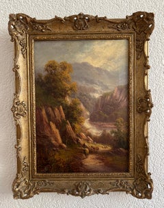 Mountain landscape with sheep by a river