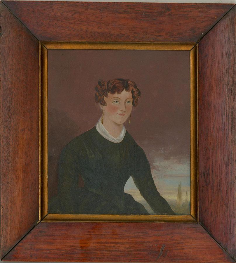 A charming naive portrait of a c.1830 woman. Presented in a bevelled rosewood frame with a gilt-effect inner edge. Unsigned. On card.


