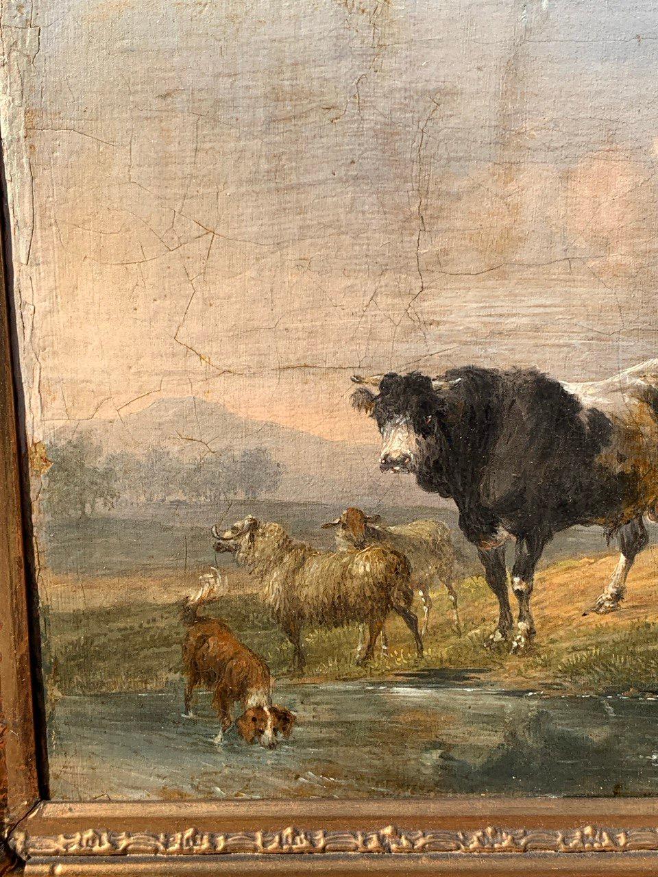 Italian painter (late 18th-early 19th century) - Landscape with cows, goats, and a dog by the stream.

21.5 x 26.5 cm unframed, 35.5 x 41.5 cm with frame.

Antique oil painting on canvas, in an antique carved and gilded wooden frame (not
