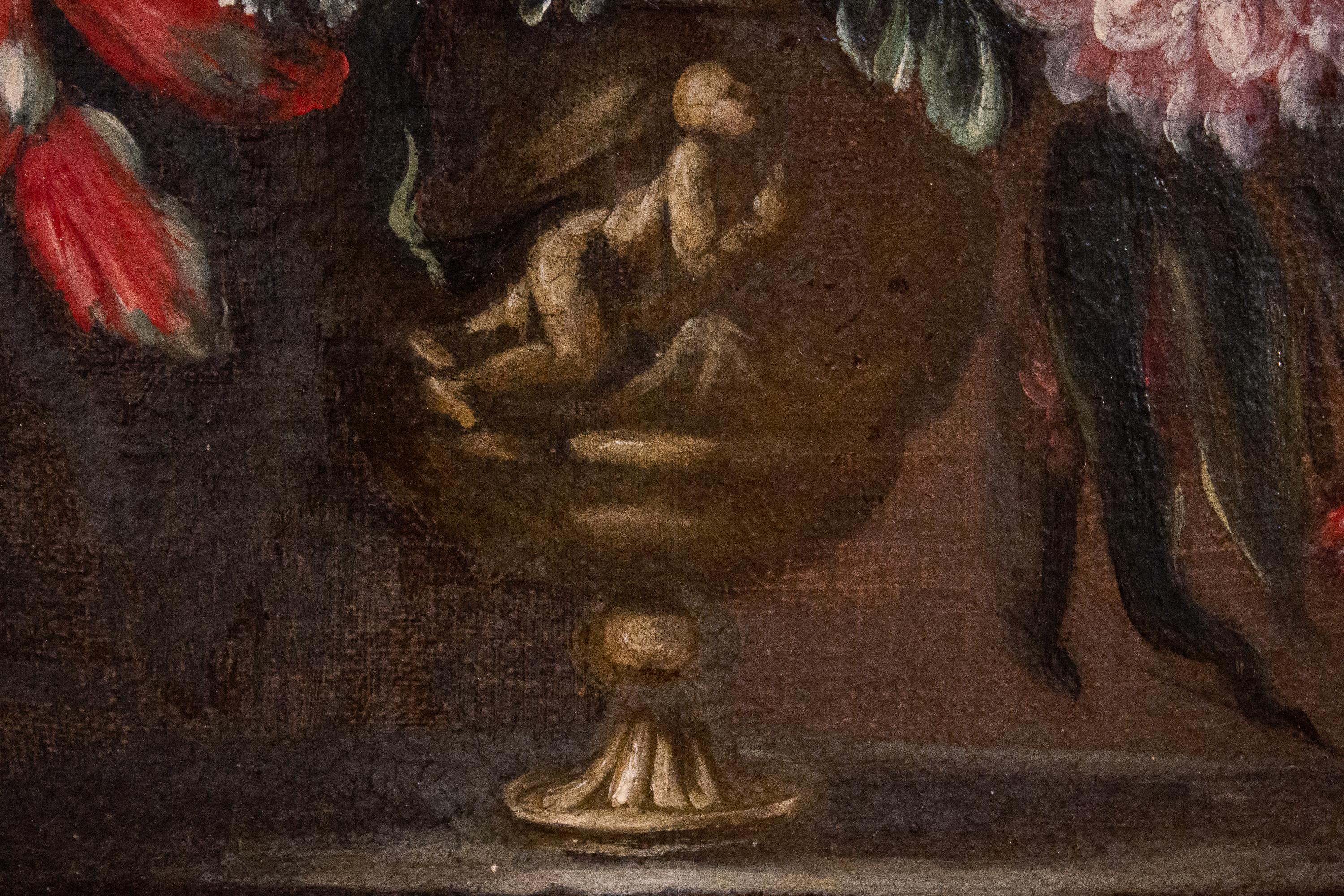 Pair of very decorative Italian Still-life paintings of flowers with vases and classical figures .
18th century, oil on canvas,  with original gilt-wood frames. 
This pair is an excellent example of the Italian  trend of emulating the Flemish still