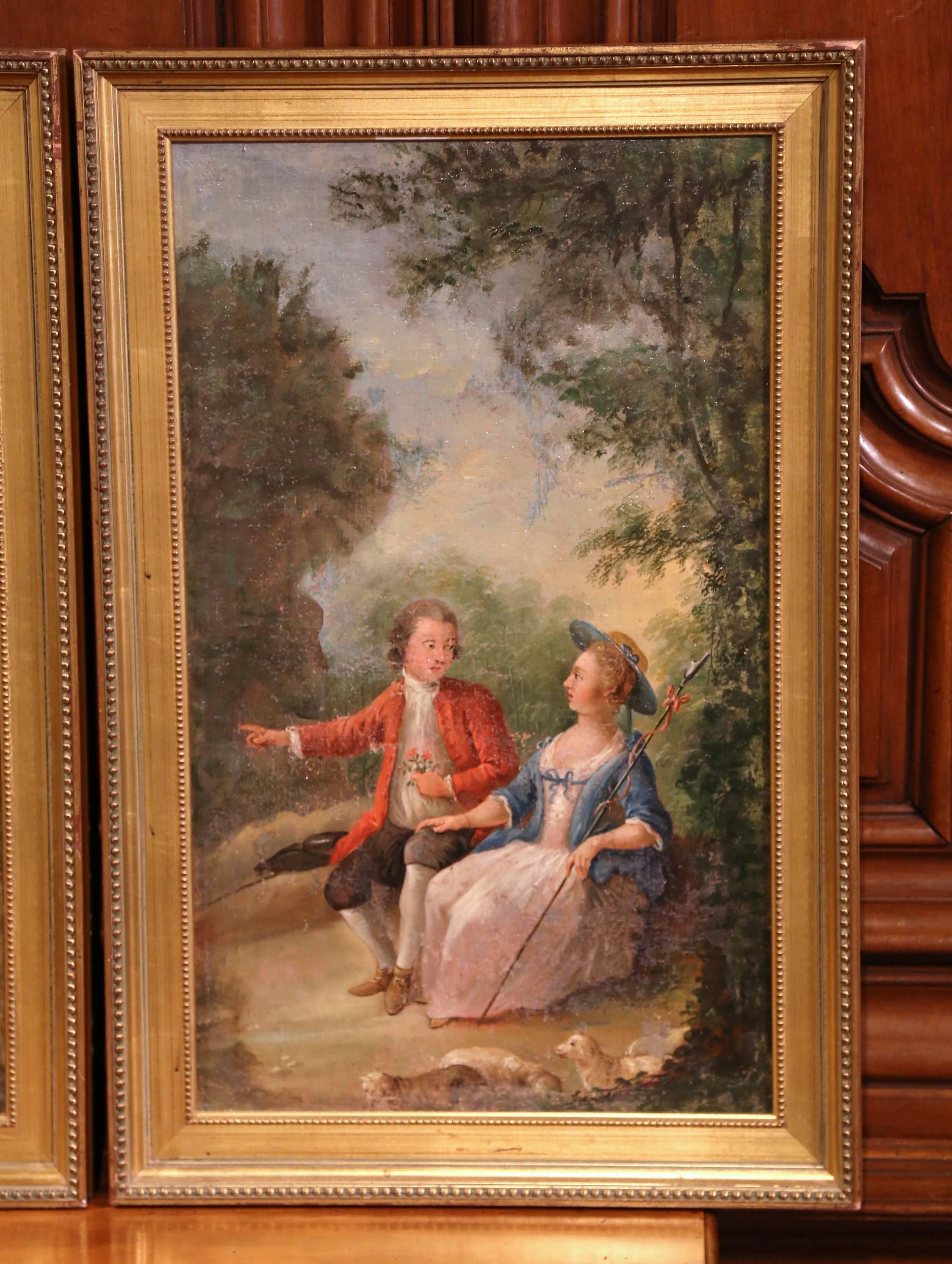 This beautiful pair of antique paintings were crafted in France circa 1780. The courtly, pastoral scenes take place in the fields and illustrate two different courting scenes. Dressed in elegant Louis XV costumes, the figures in each painting are