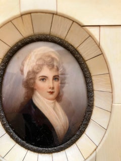 Pair of 19 century oil on porcelain portraits