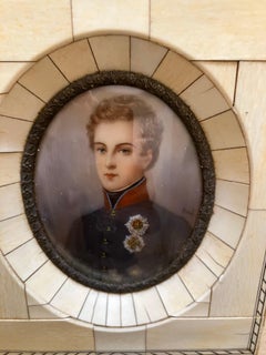 Pair of 19 century oil on porcelain portraits