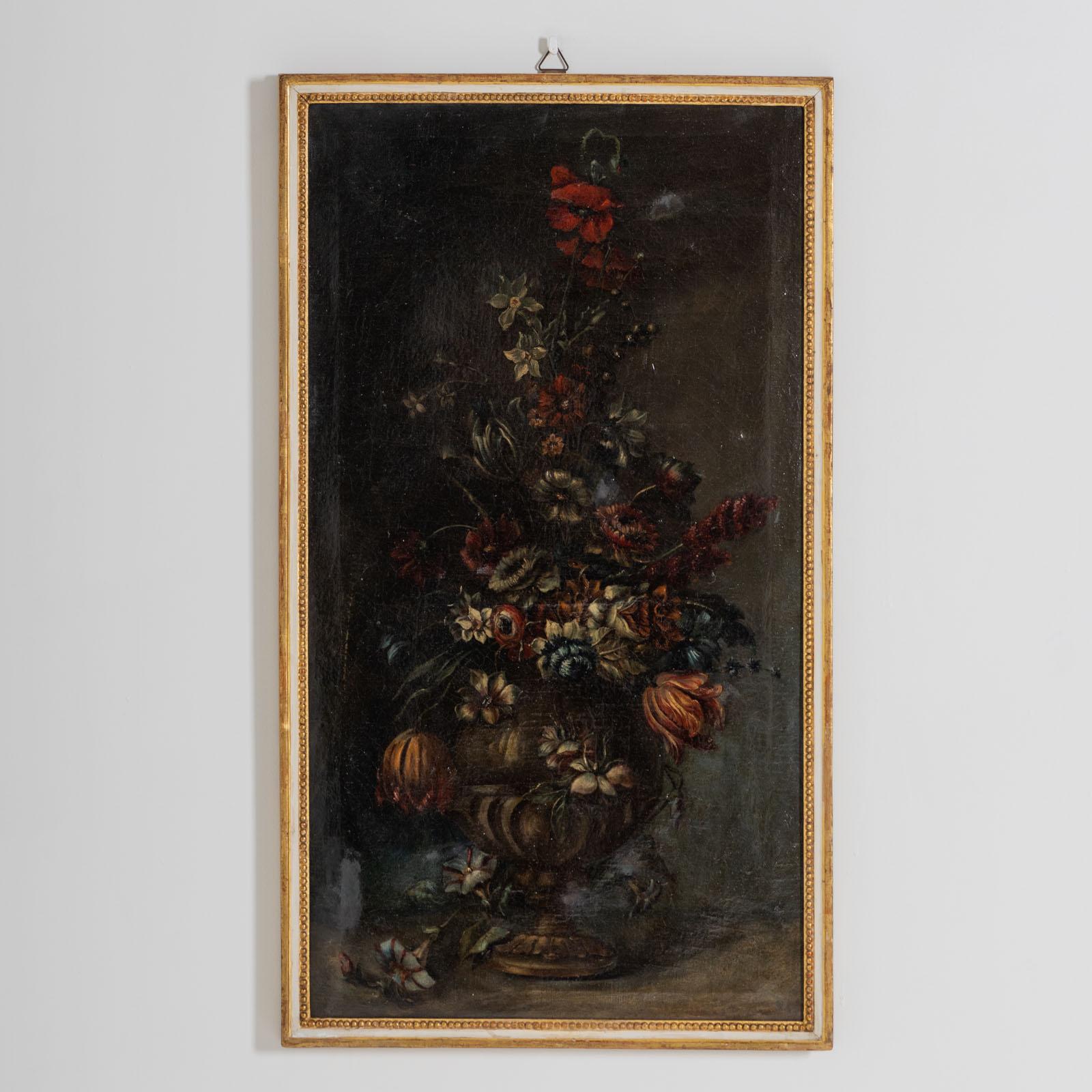 Pair of still life paintings with floral vases in Baroque style. The vertically arranged bouquets display a wonderful composition of various colorful flowers. 
Oil on canvas.
Image size: 91 x 49 cm.
Frames from the early 19th century, painted white