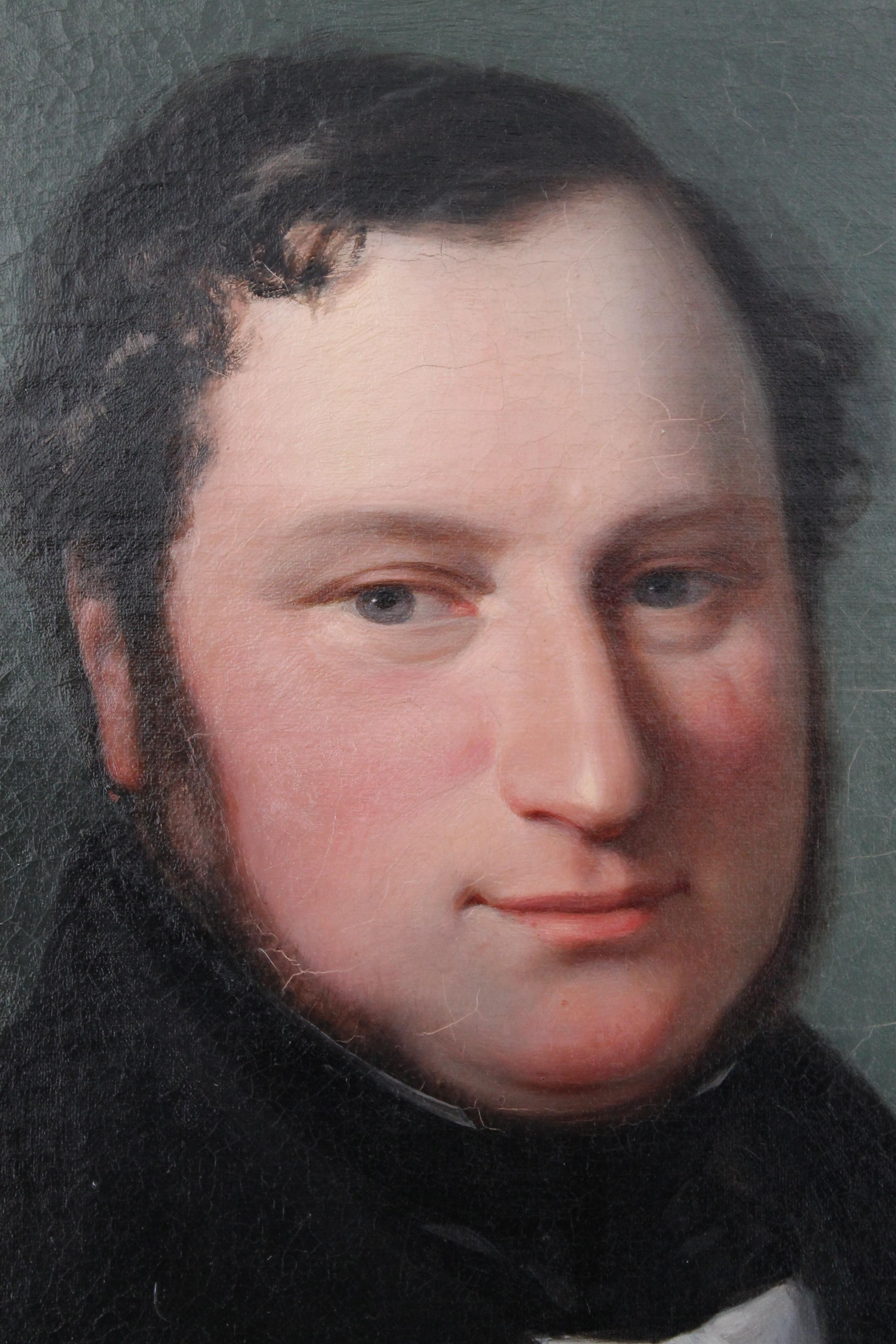 A classic romantic portrait of a man on stretched canvas in a rectangular frame with an oval setting.  This painting was found in France but is likely to be of German origin.  A gentleman, possibly younger than he appears, looks towards the artist. 