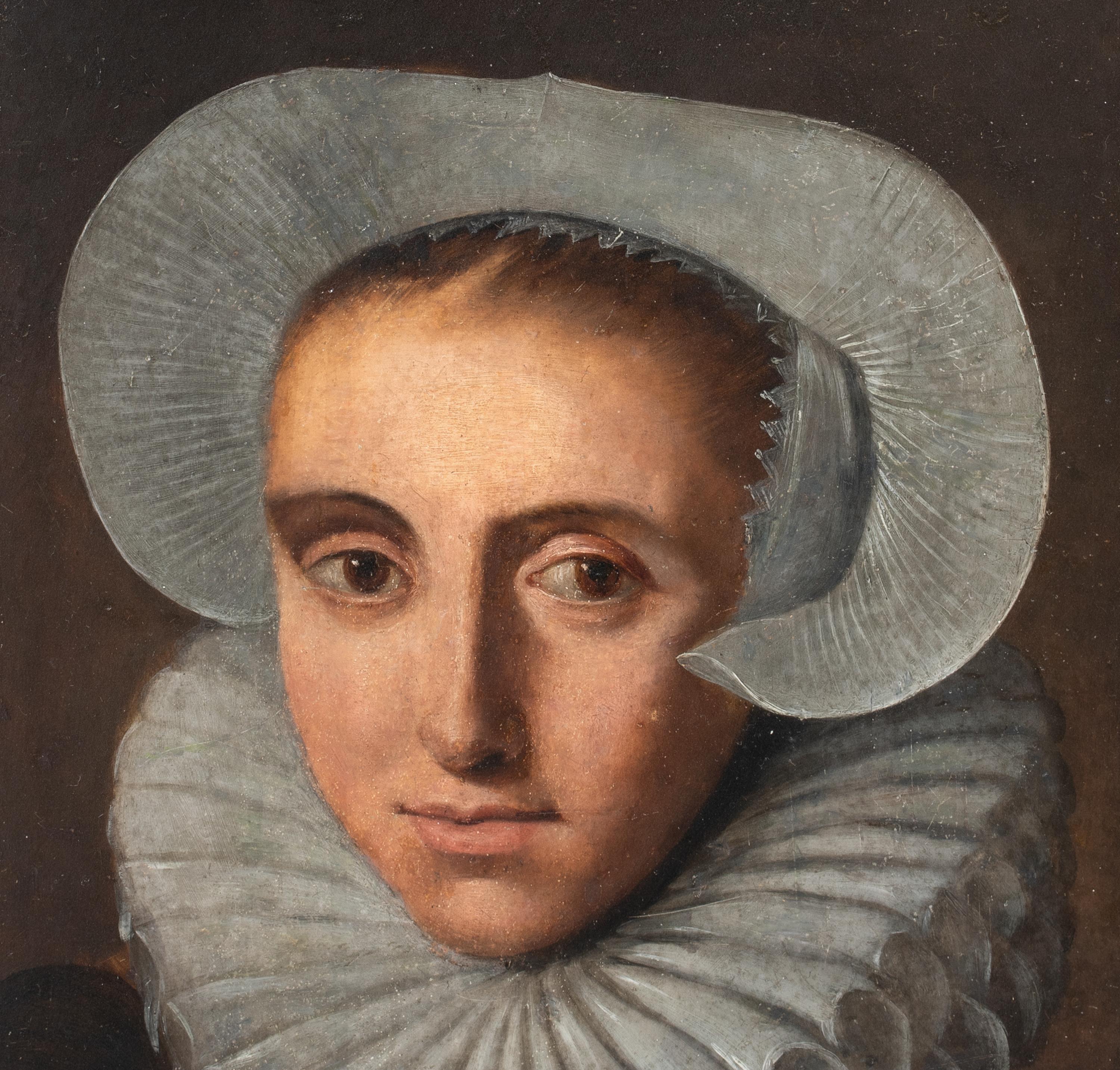 Portrait d'une femme dans un chapeau et une manchette en dentelle, 17e siècle  École hollandaise 1640 en vente 2