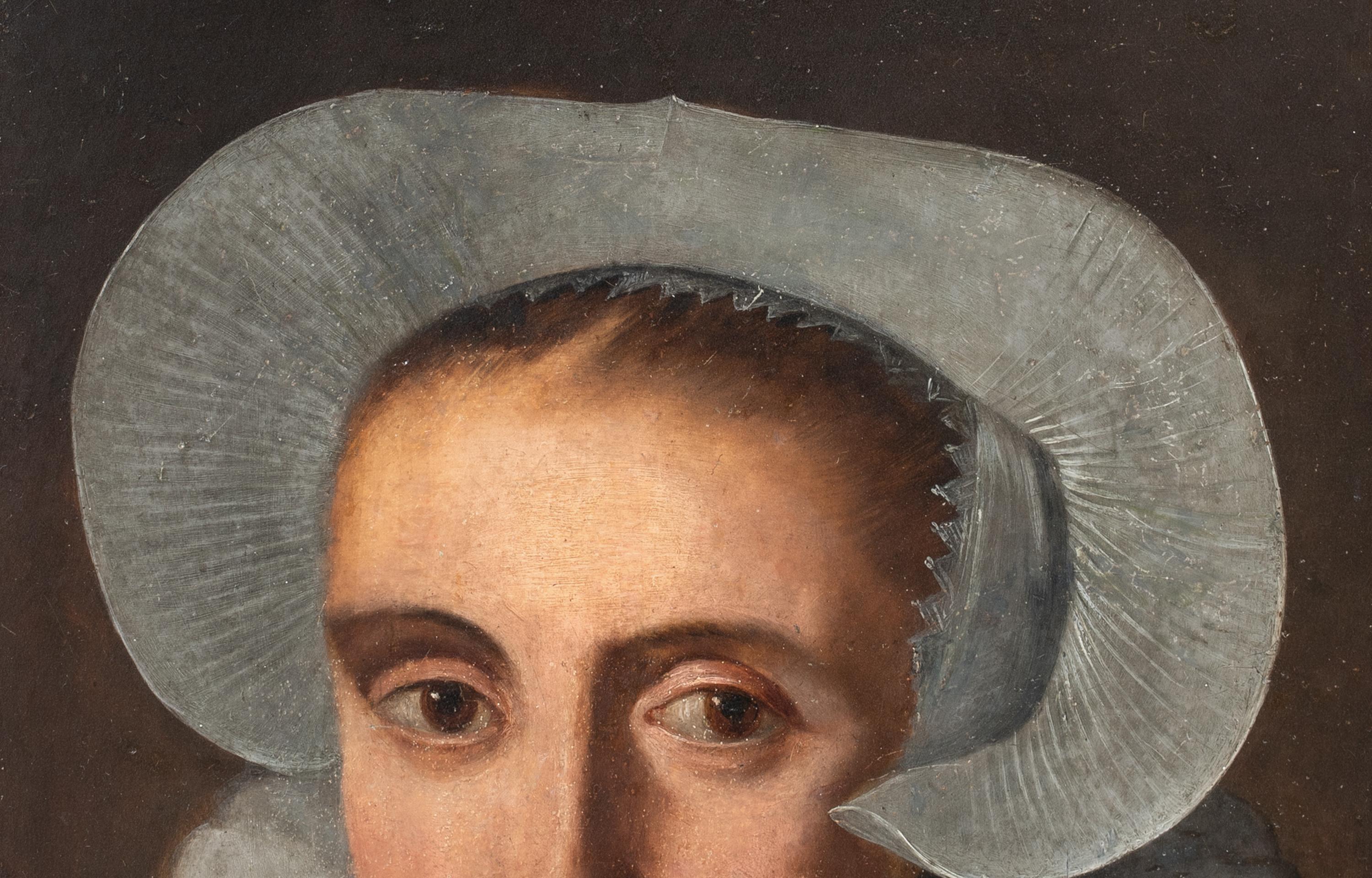 Portrait d'une femme dans un chapeau et une manchette en dentelle, 17e siècle  École hollandaise 1640 en vente 3