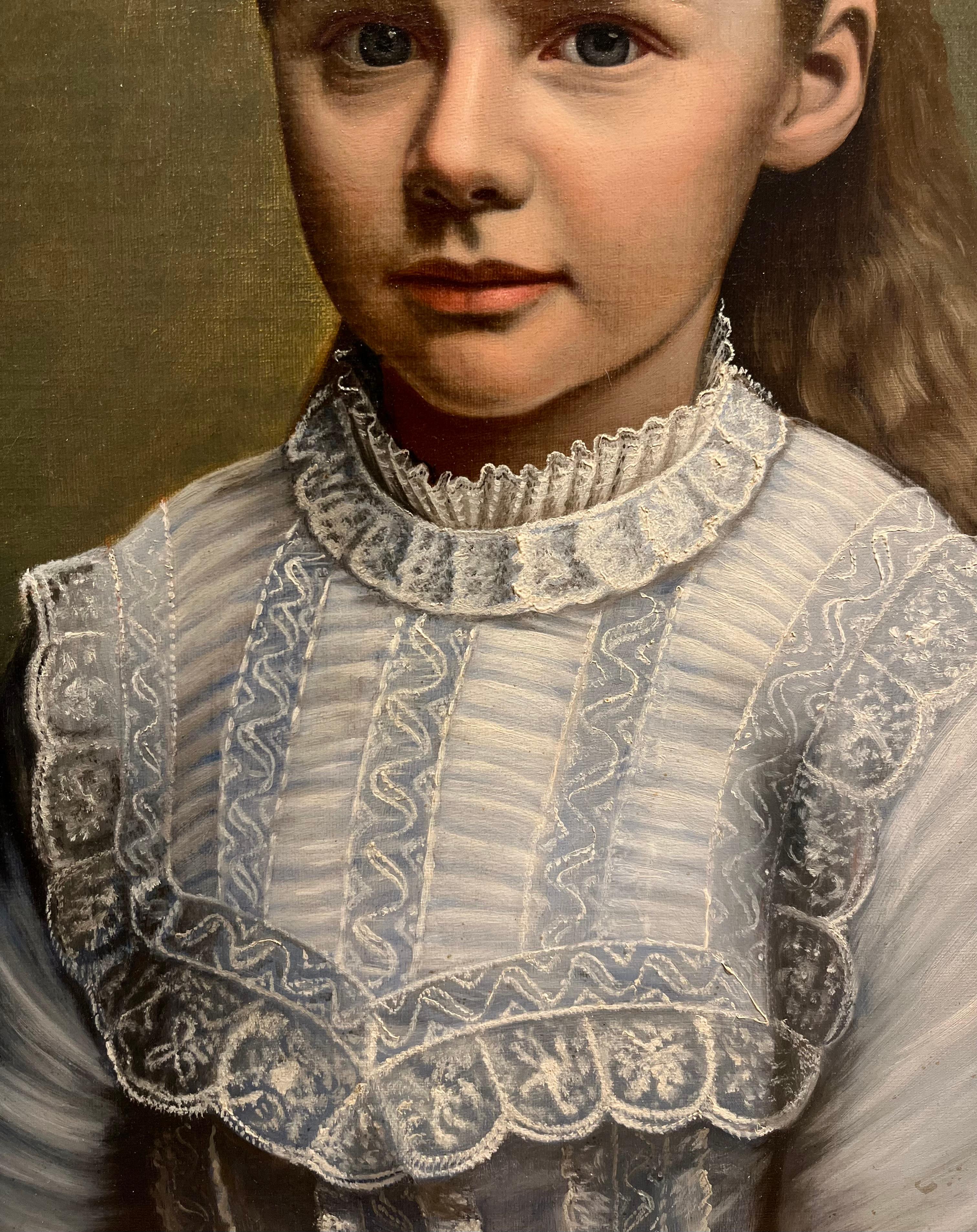 This finely rendered American School portrait of a young girl reflects the careful attention to detail and craftsmanship of late 19th to early 20th-century portraiture. The sitter, dressed in an elaborately embroidered white lace dress with delicate
