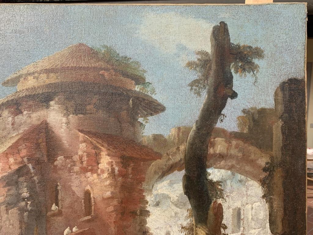Italian master (18th century) - Landscape with ruins and characters.

97 x 138cm.

Antique oil painting on canvas, without frame.

Condition report: Painting subjected to relining. Good state of conservation of the pictorial surface, with traces of