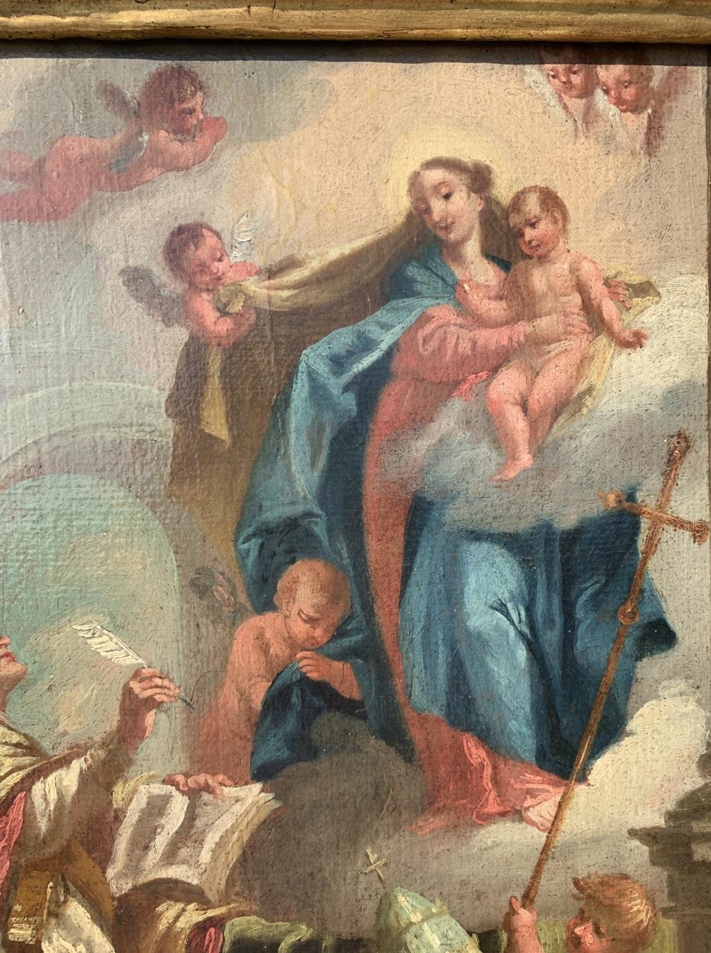 Venetian painter (18th century) - Madonna with Child, adoring saint and cherubs.

40 x 27.5 cm without frame, 51.5 x 40 cm with frame.

Antique oil painting on canvas, in an antique lacquered wooden frame.

Condition report: Original canvas. Good
