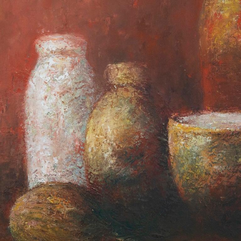Captured in a fiery colour palette, this impressionistic painting depicts a still life of bottles and onions, loosely rendered in oils. Signed to the lower right. On board. 
