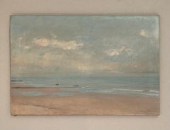 Sandy beach with boats and pontoon