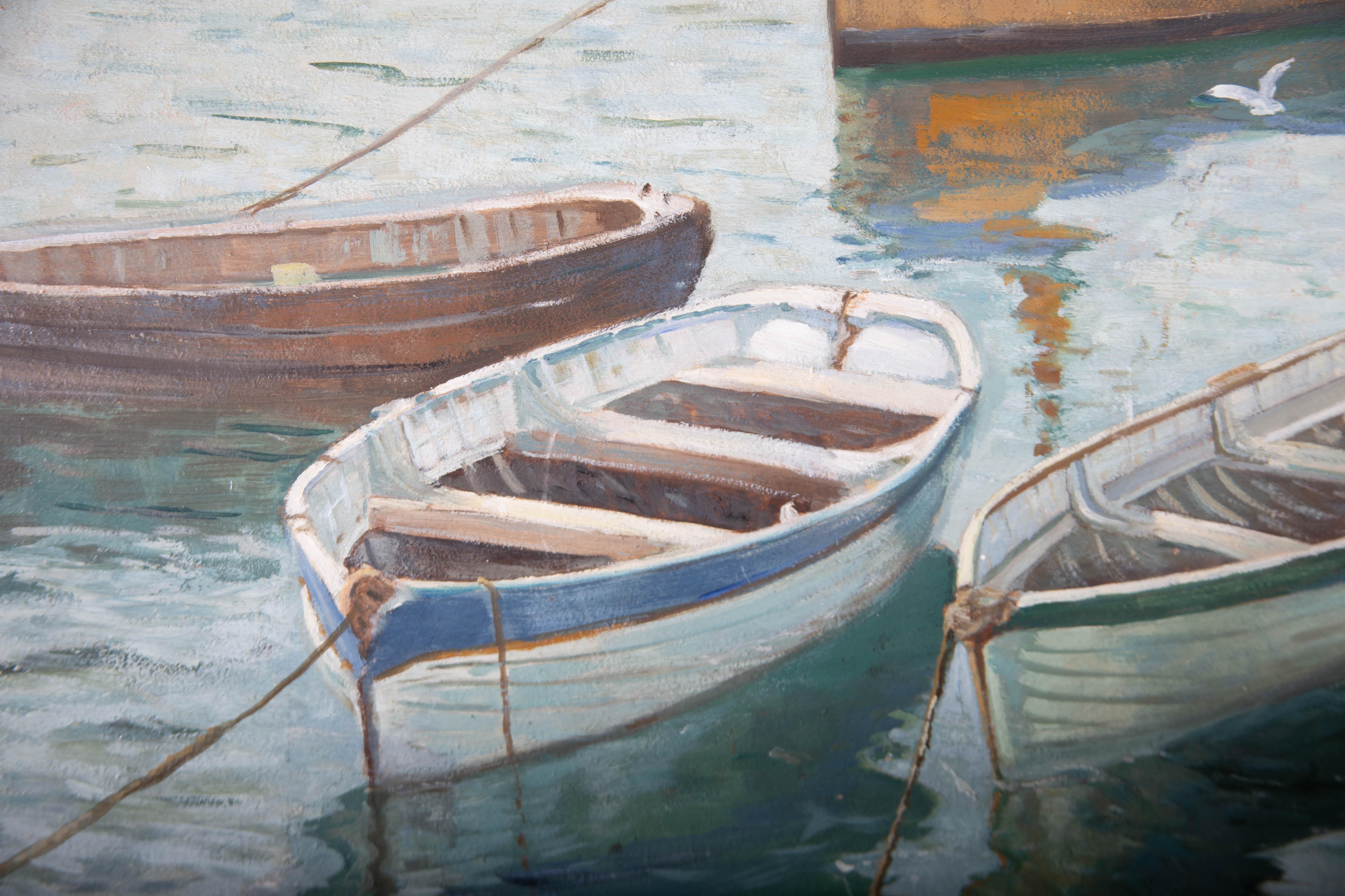 Loose oils capture a quiet moment at the harbour. The artwork holds a fluid realism and renders the tranquil moment to a pristine effect. The artwork is unsigned and is well presented in a painted wood frame. On board.
