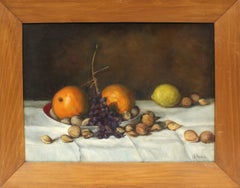 Nature morte vintage aux fruits, signée Unknown, composée d'oranges, de citrons et de noix