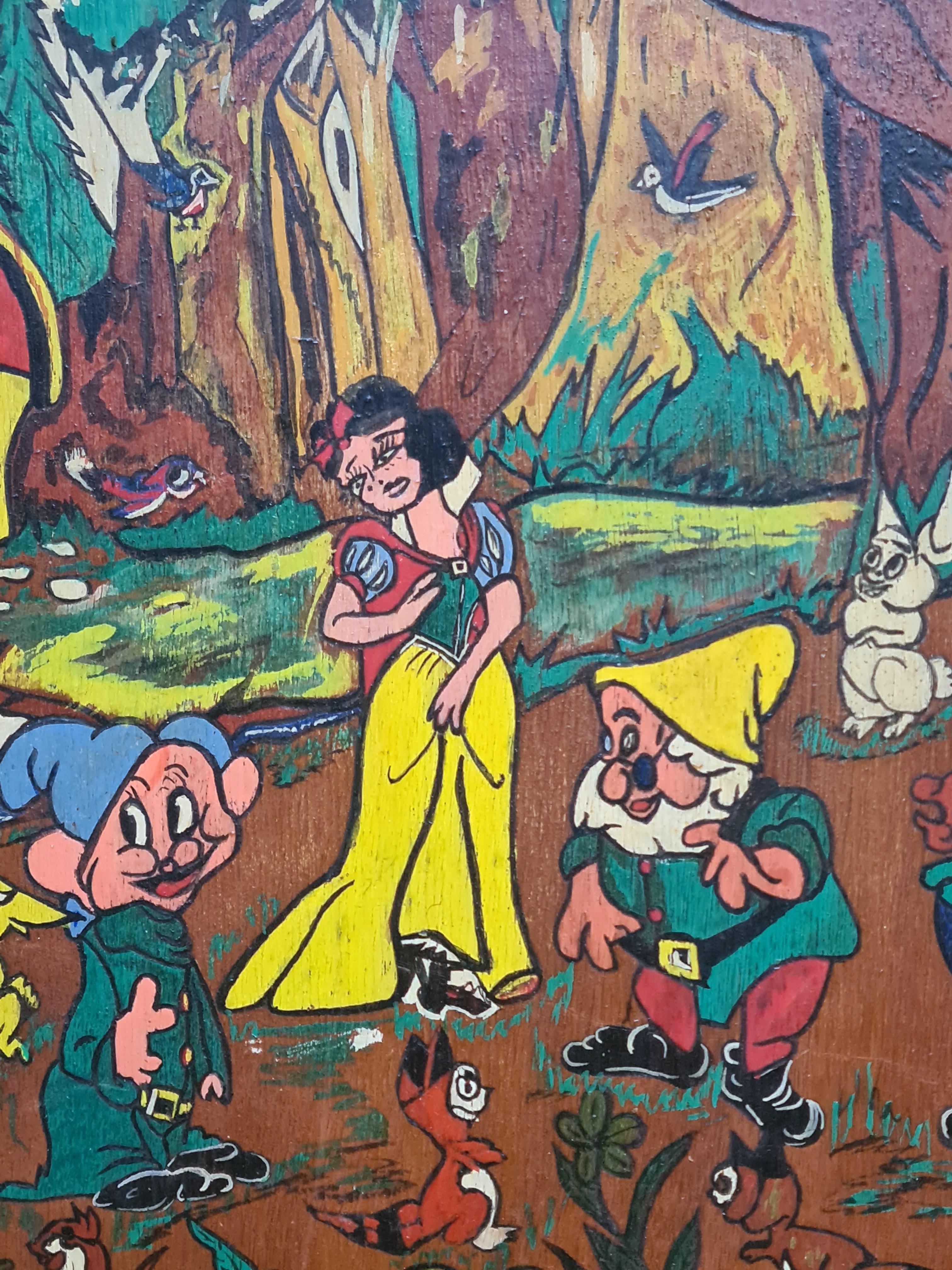 Snow White and the Seven Dwarfs in a landscape, Mid century oil on wood panel.

This vibrant and charming painting vividly portrays a whimsical forest scene featuring Snow White and the Seven Dwarfs. Each easily recognisable dwarf with unique facial