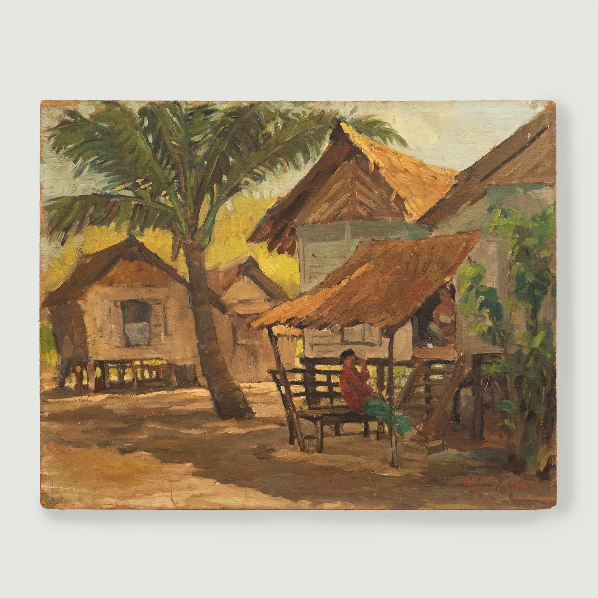A peaceful oil landscape depicting Malaysian villagers resting from the midday sun under a shaded timber awning. Illegibly signed to the lower right and dated 1949. On board.
