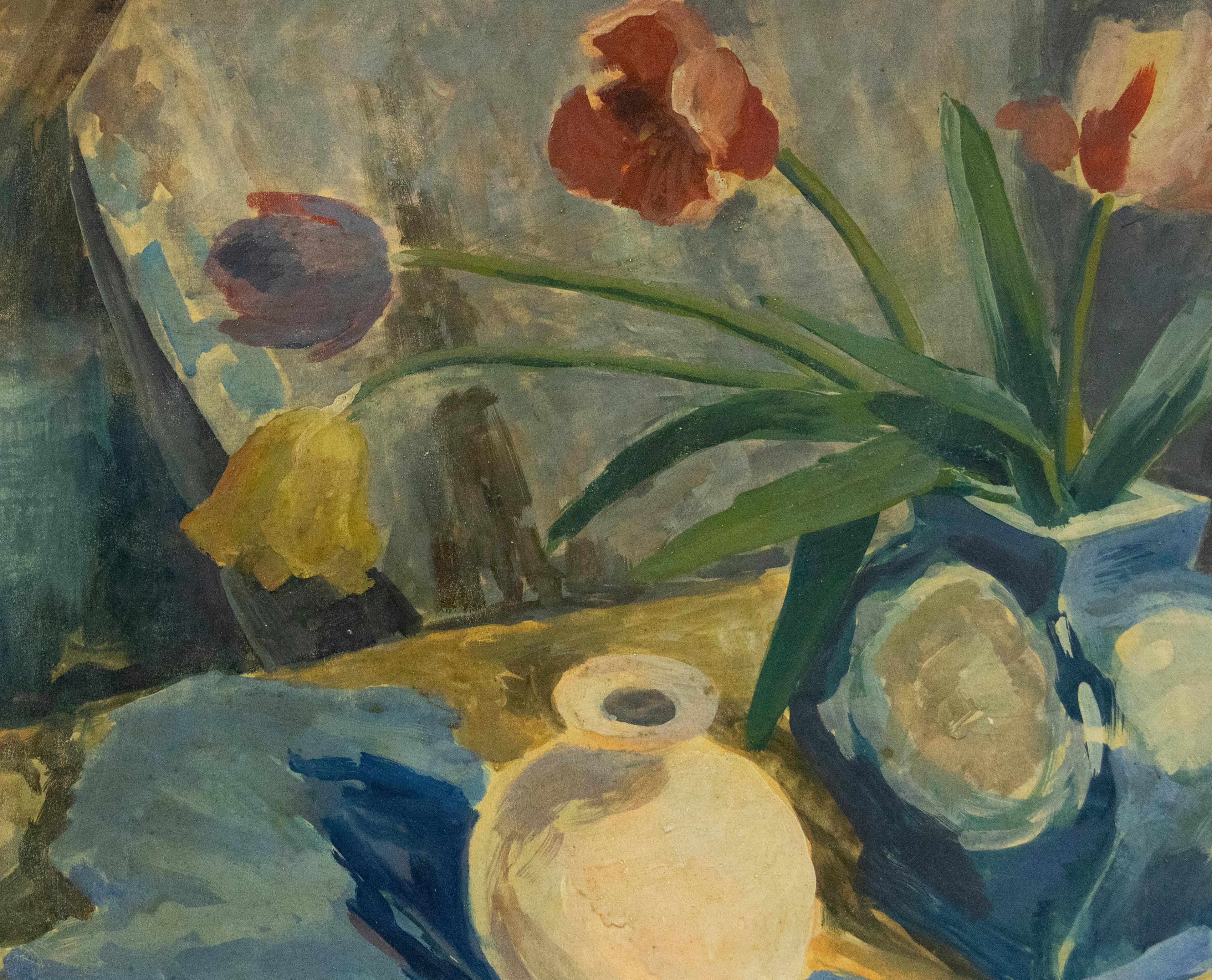 A wonderful still life study depicting a ceramic vase filled with tulips. The muted colour palette and gestural brushwork gives a nod towards Bloomsbury School style which often saw compositions focused around every objects and flowers. The artist