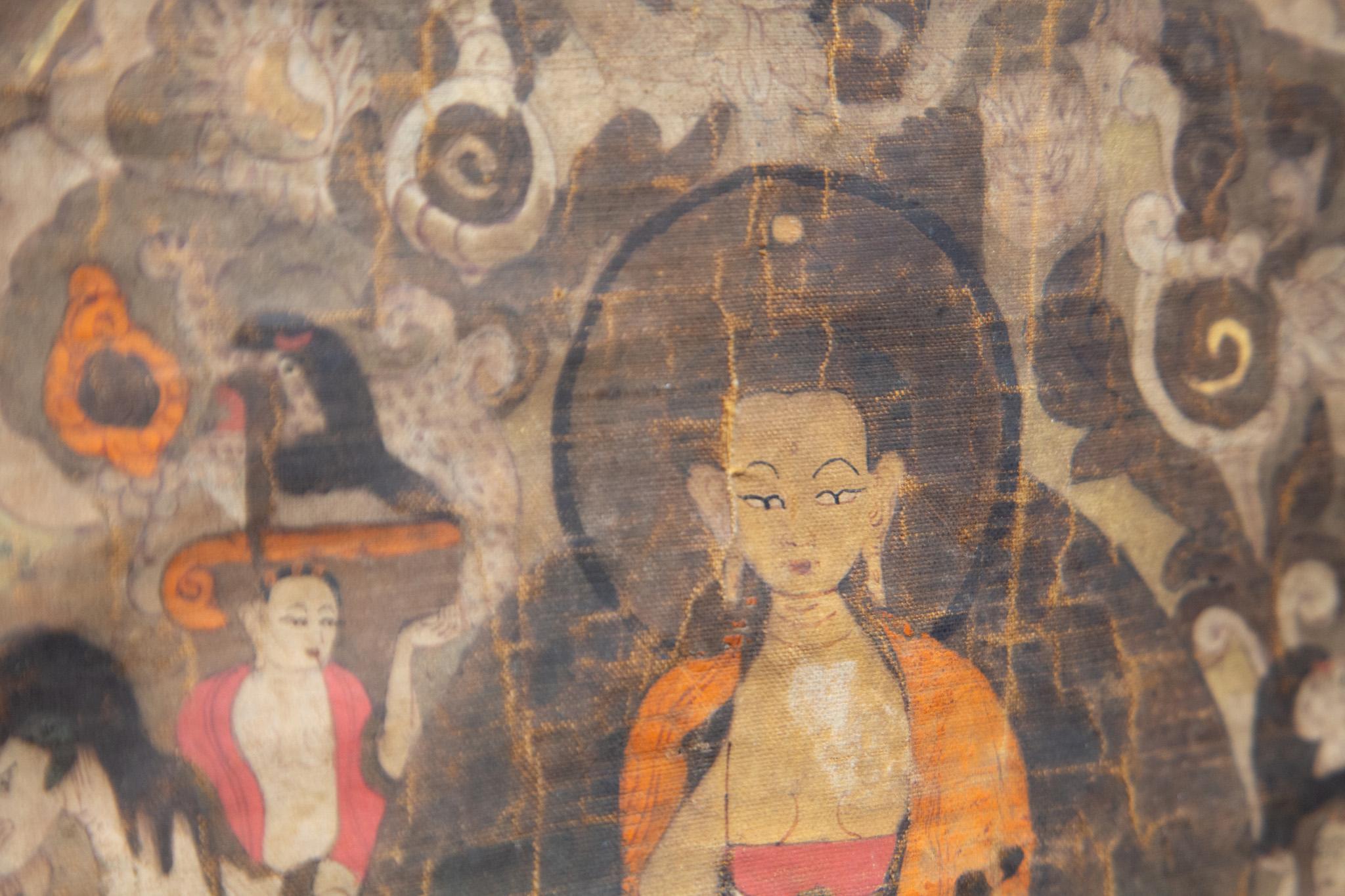  TIBETAN THANGKA BUDDHA AVEC ATTENdanTS
      Incroyable Bouddha Thangka tibétain ancien du 17e siècle avec ses assistants, tissu tibétain et pigment de couleur minéral. Encadré professionnellement dans un magnifique cadre en laiton massif.
     