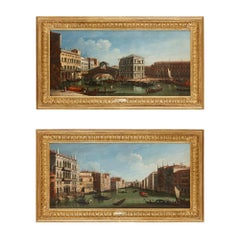 Two Venetian vedute oil paintings in giltwood frames after Canaletto