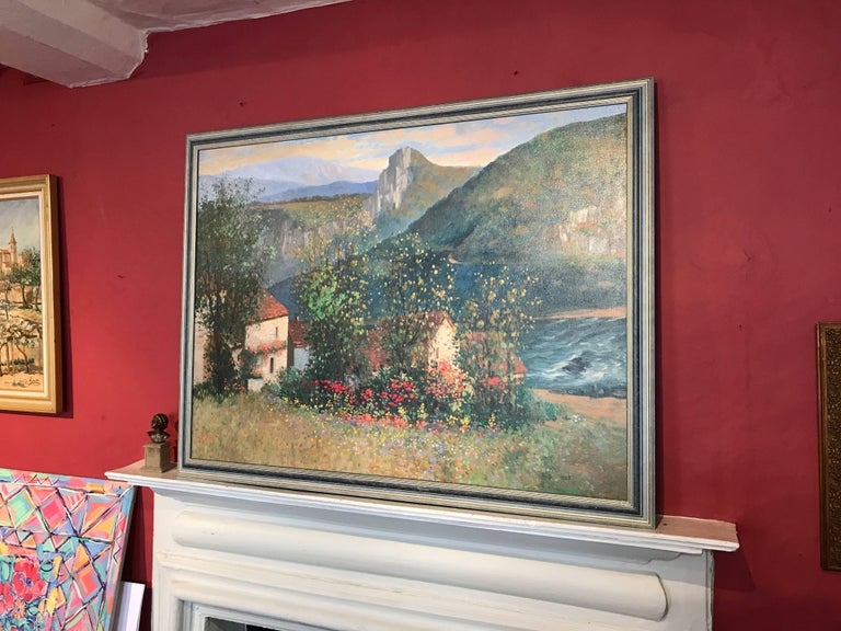 Superb French Impressionist oil painting depicting this beautiful landscape with river gorge or estuary behind. The fields are full of wild flowers and poppies, set against old stone cottages. 

The painting is signed by the artist to the lower