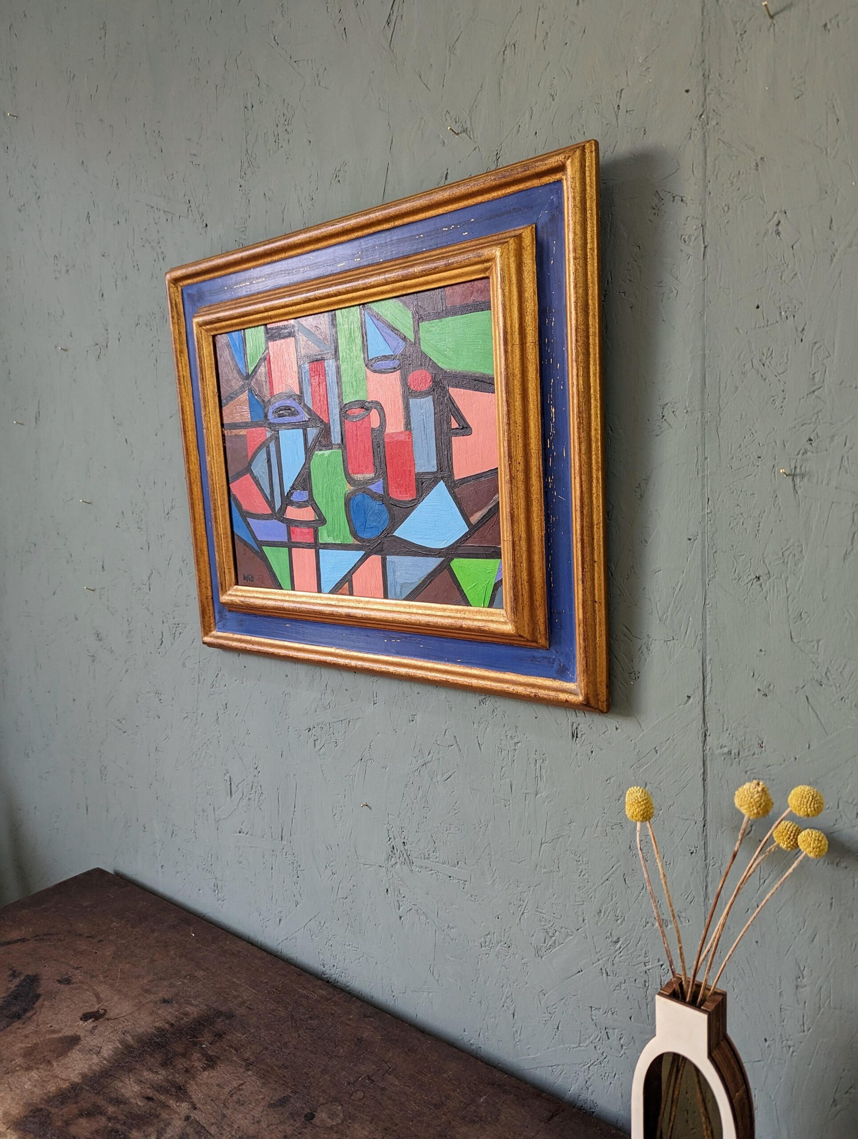 GEOMETRIC STILL LIFE
Size: 41.5 x 49.5 cm (including frame)
Oil on board

A vibrant and playful mid century cubist modernist composition in oil, painted on board.

With a focus on shape, colour and line, the artist has abstracted what appears to be